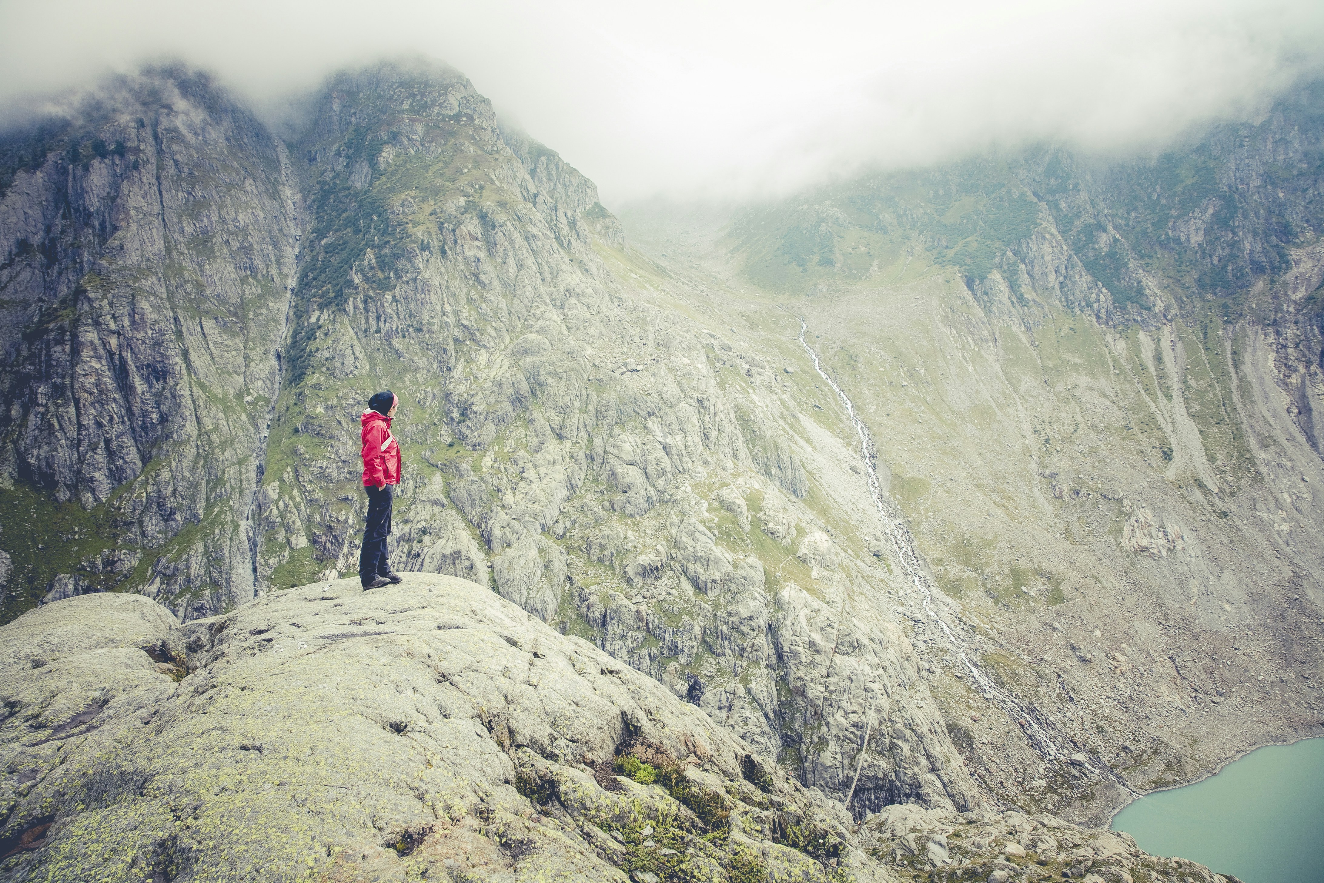 Hiker Overlooks Mountain Valley