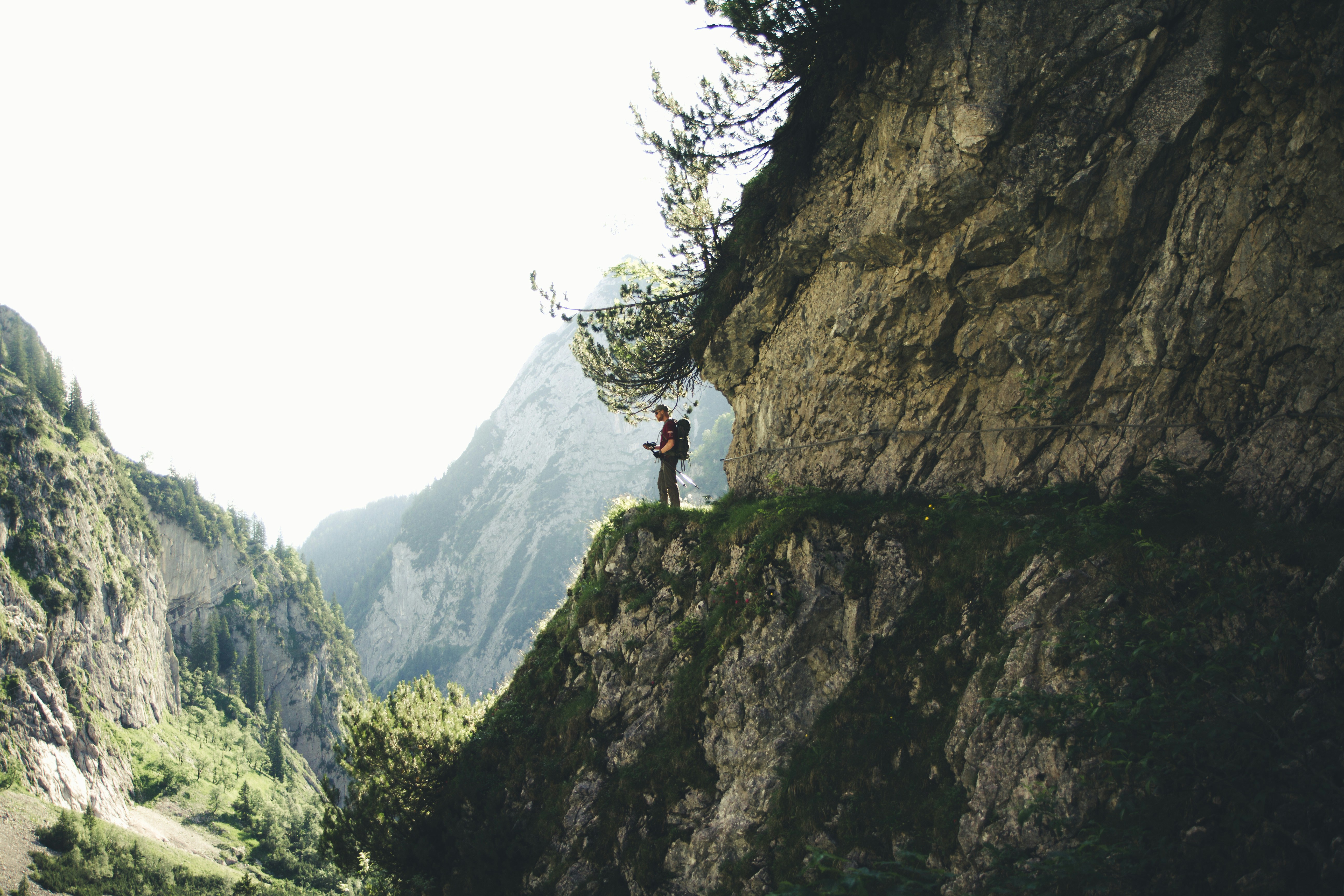 Hiker on Mountain Cliff Path