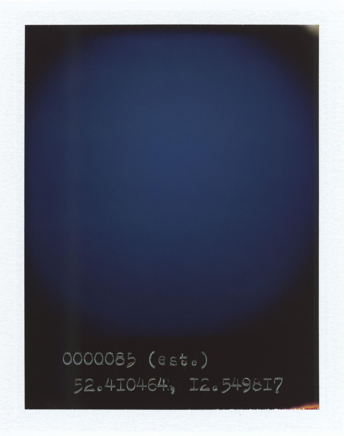 Polaroid with Handwritten Coordinates