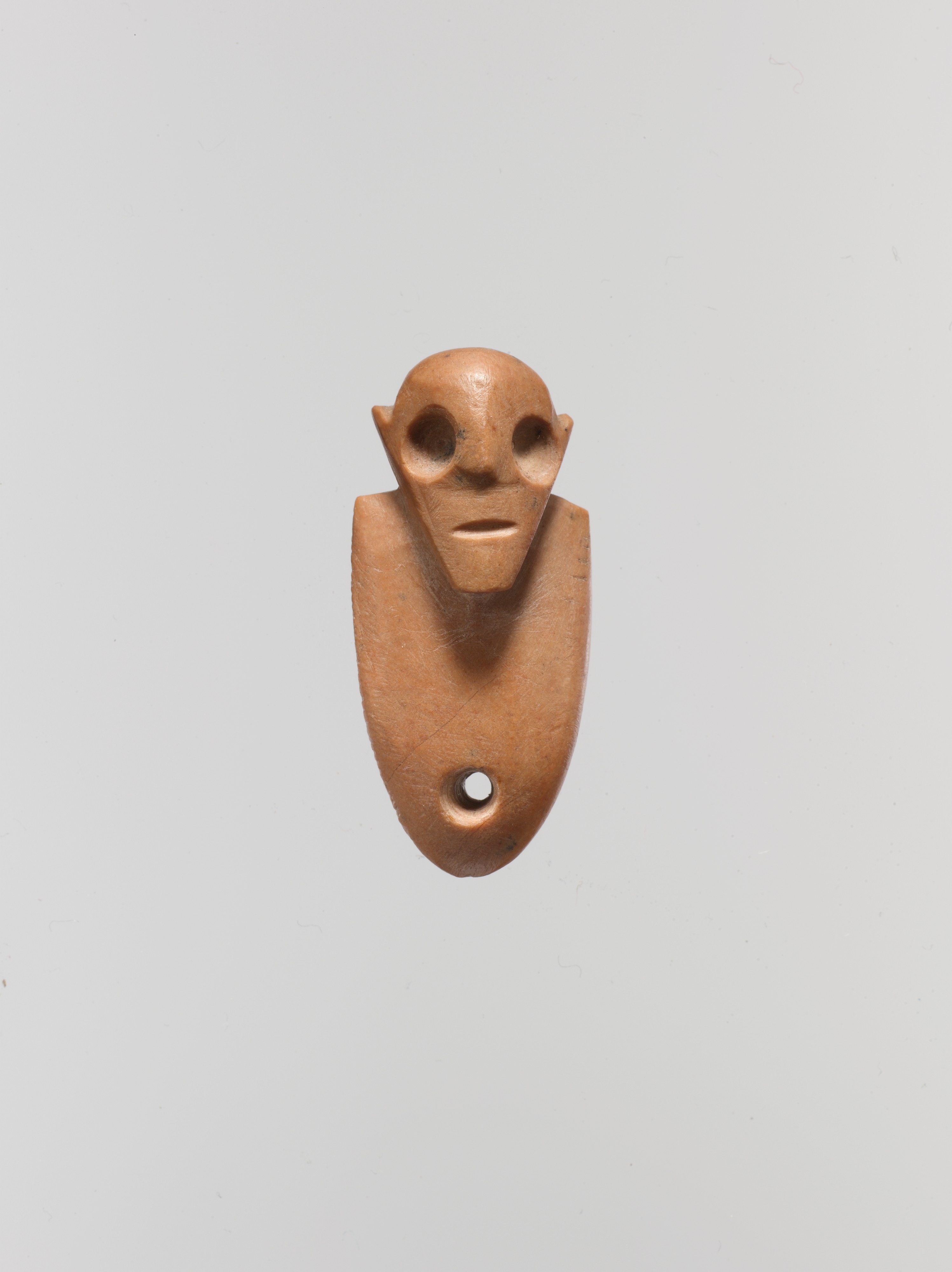 Ancient Carved Human Head Pendant