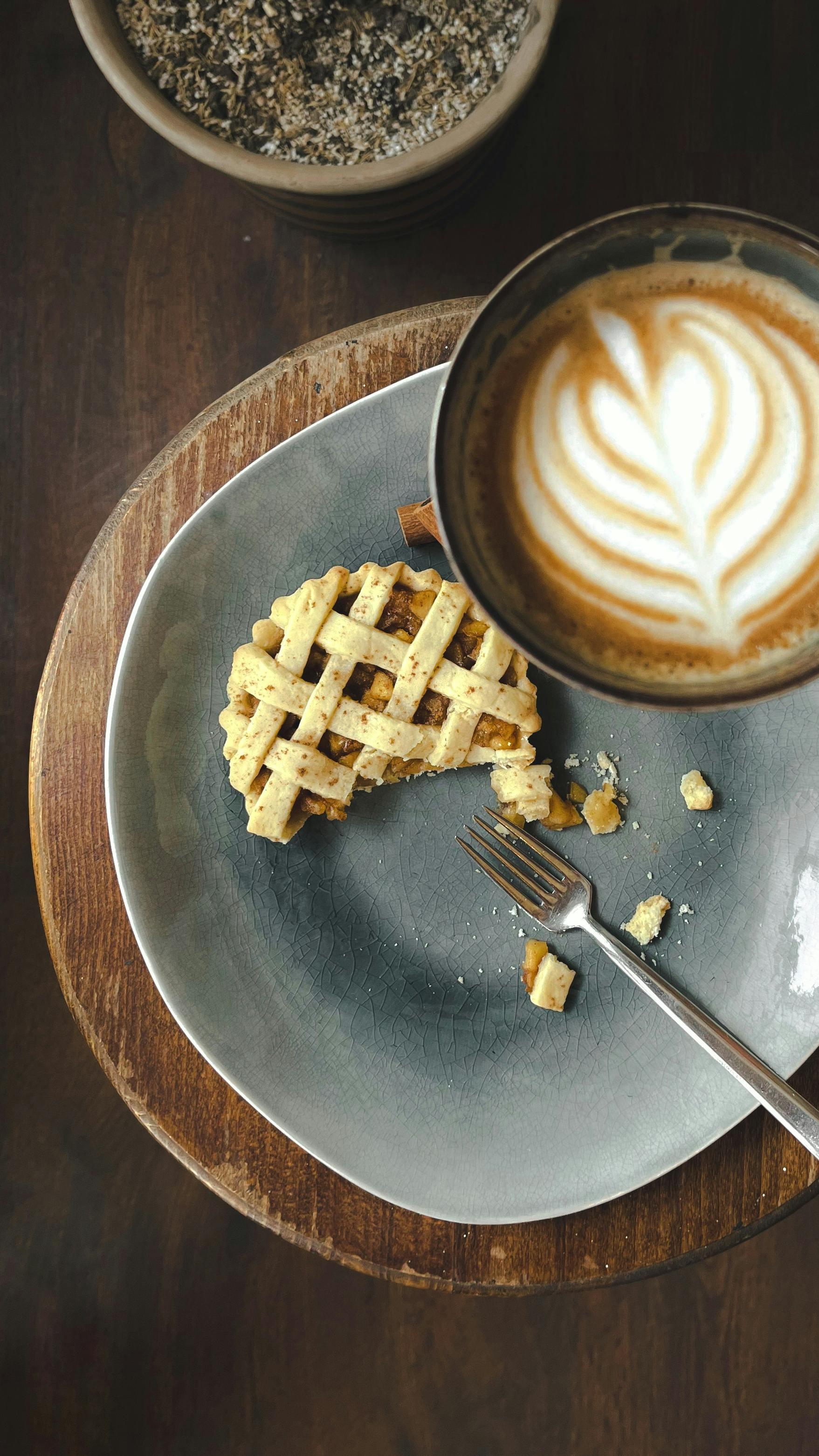 Half Eaten Mini Pie and Latte