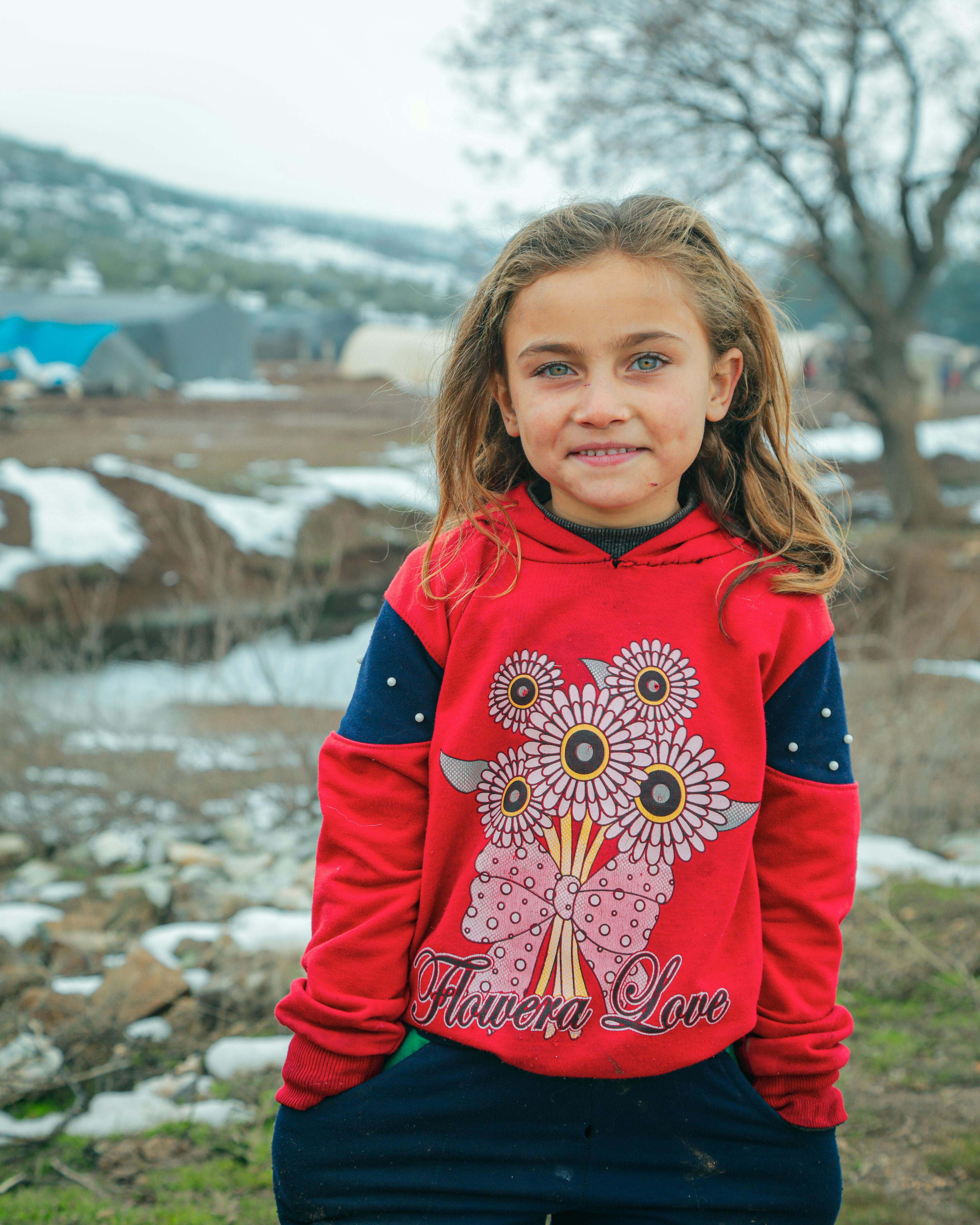 Smiling Young Girl In Snowy Outdoors