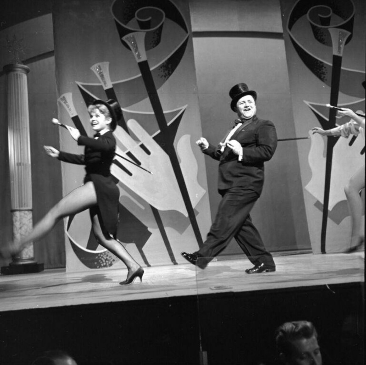 Two Performers Dancing On Stage