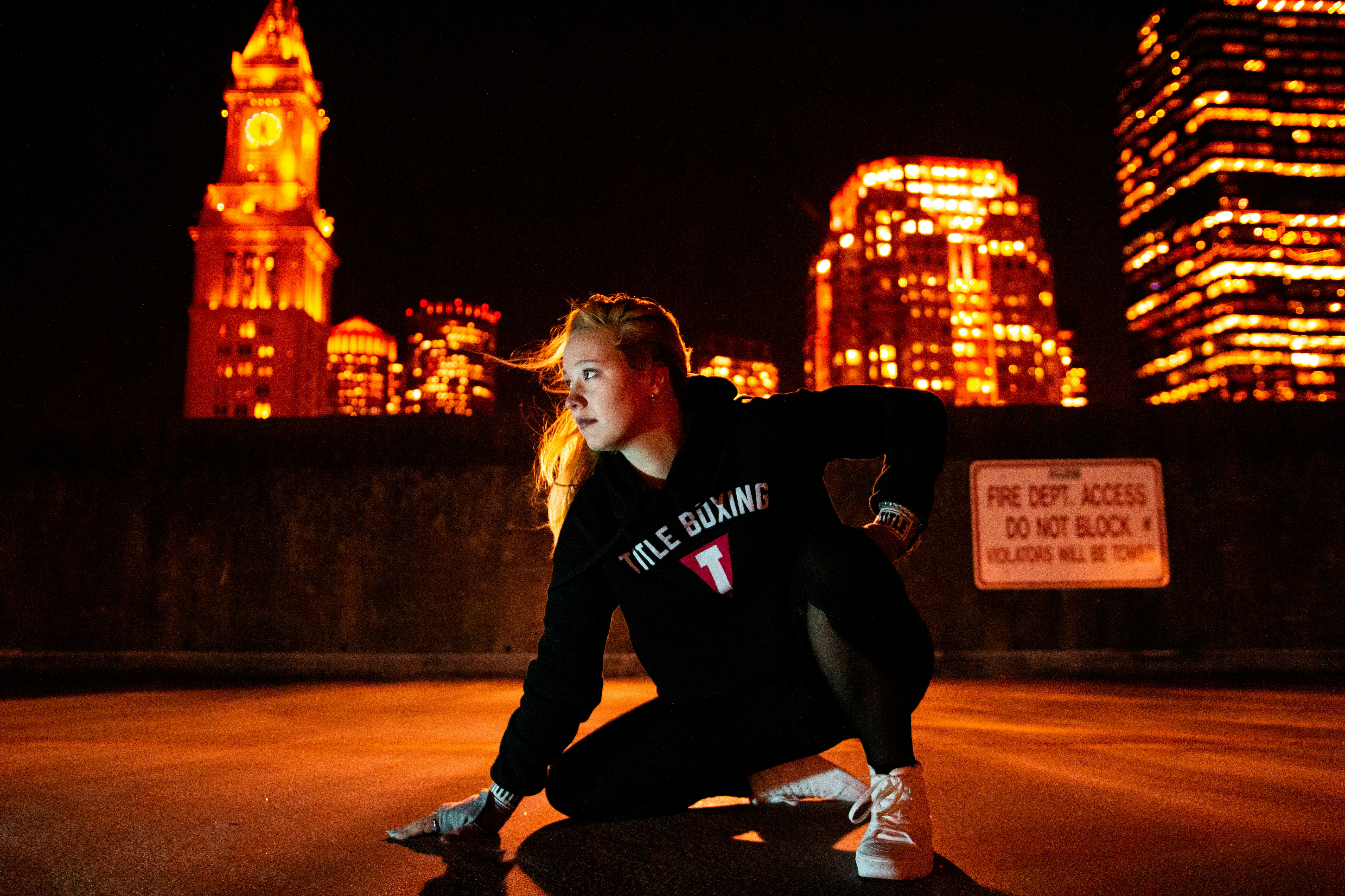 Female Boxer Posing In Night City