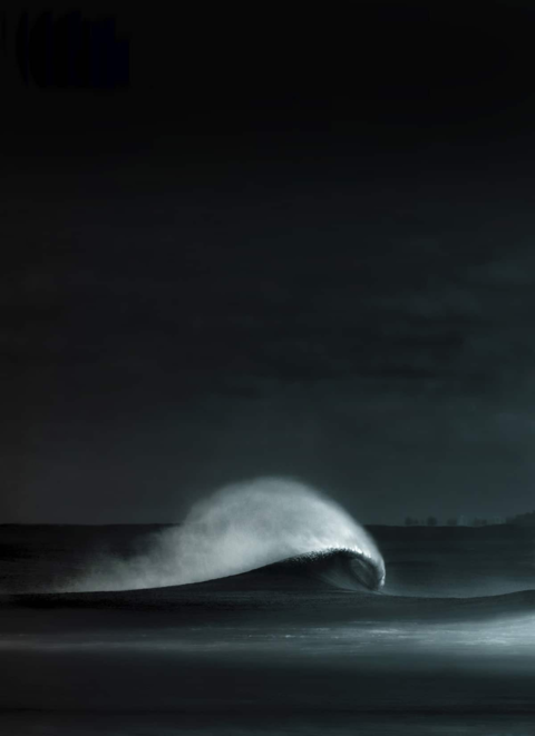 Breaking Ocean Wave at Night