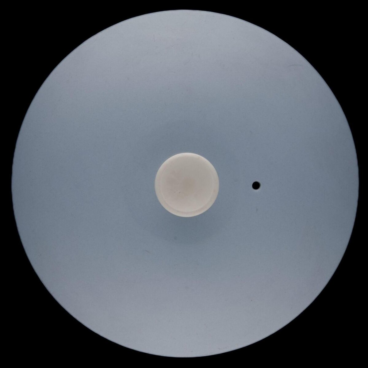 White Disc with Offset Small Hole