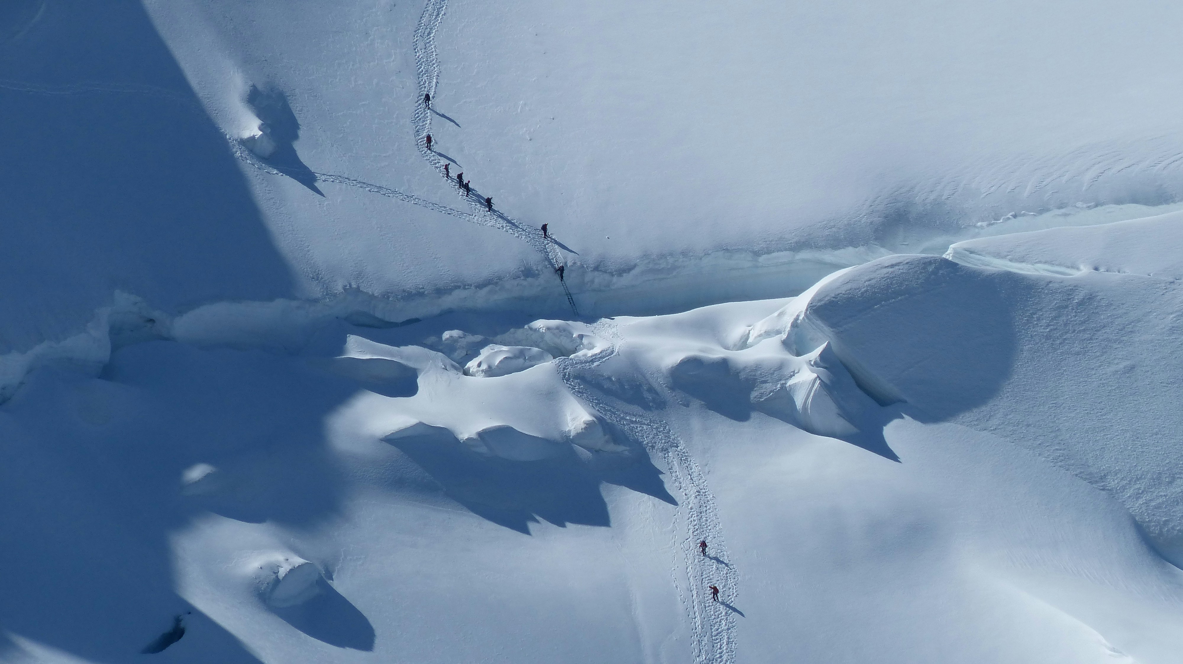 Mountaineers Crossing Glacier Crevasse