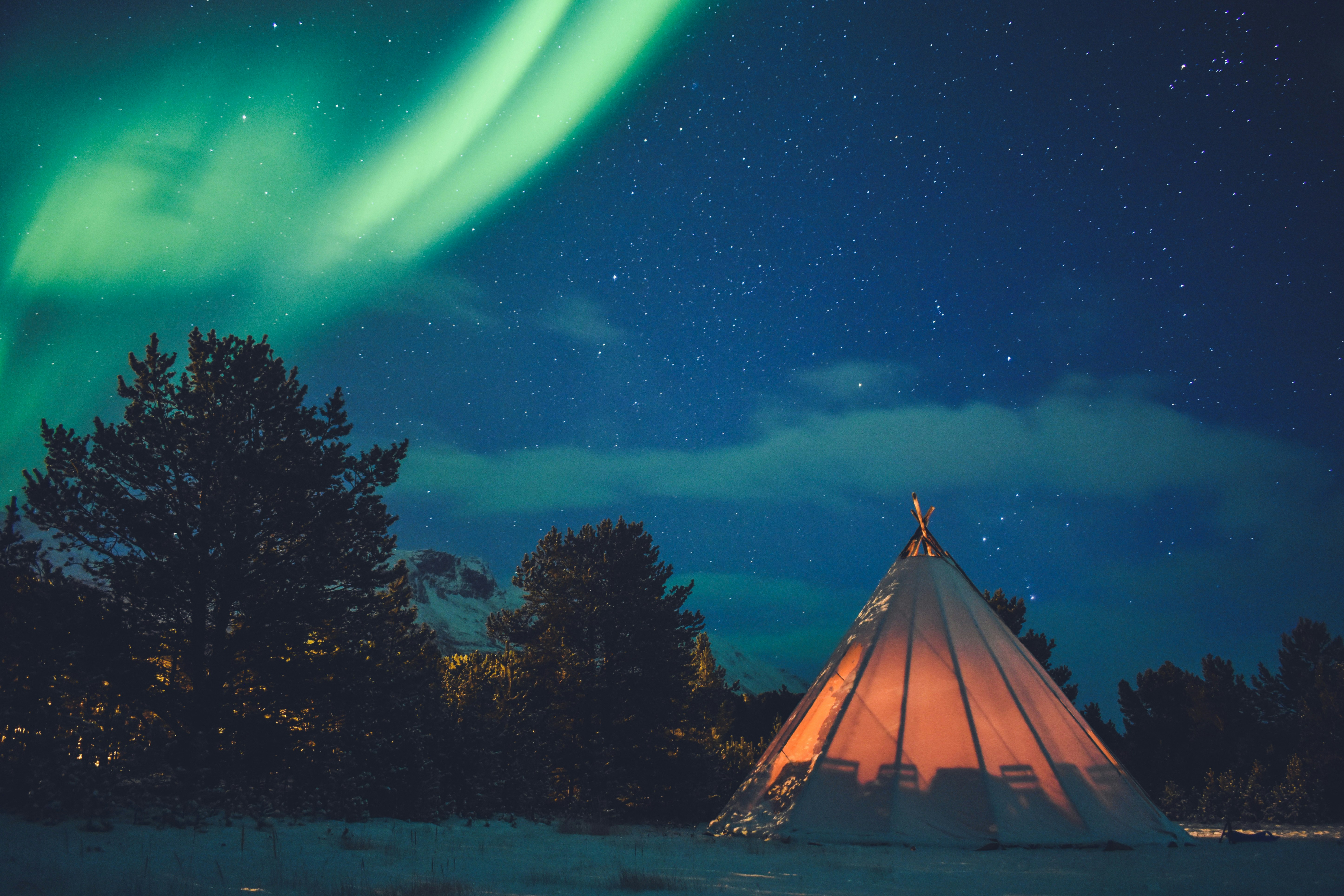 Northern Lights Over Snowy Tipi