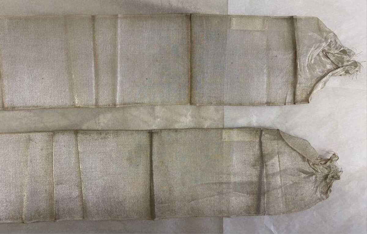 Two Folded Antique Light Silk Strips