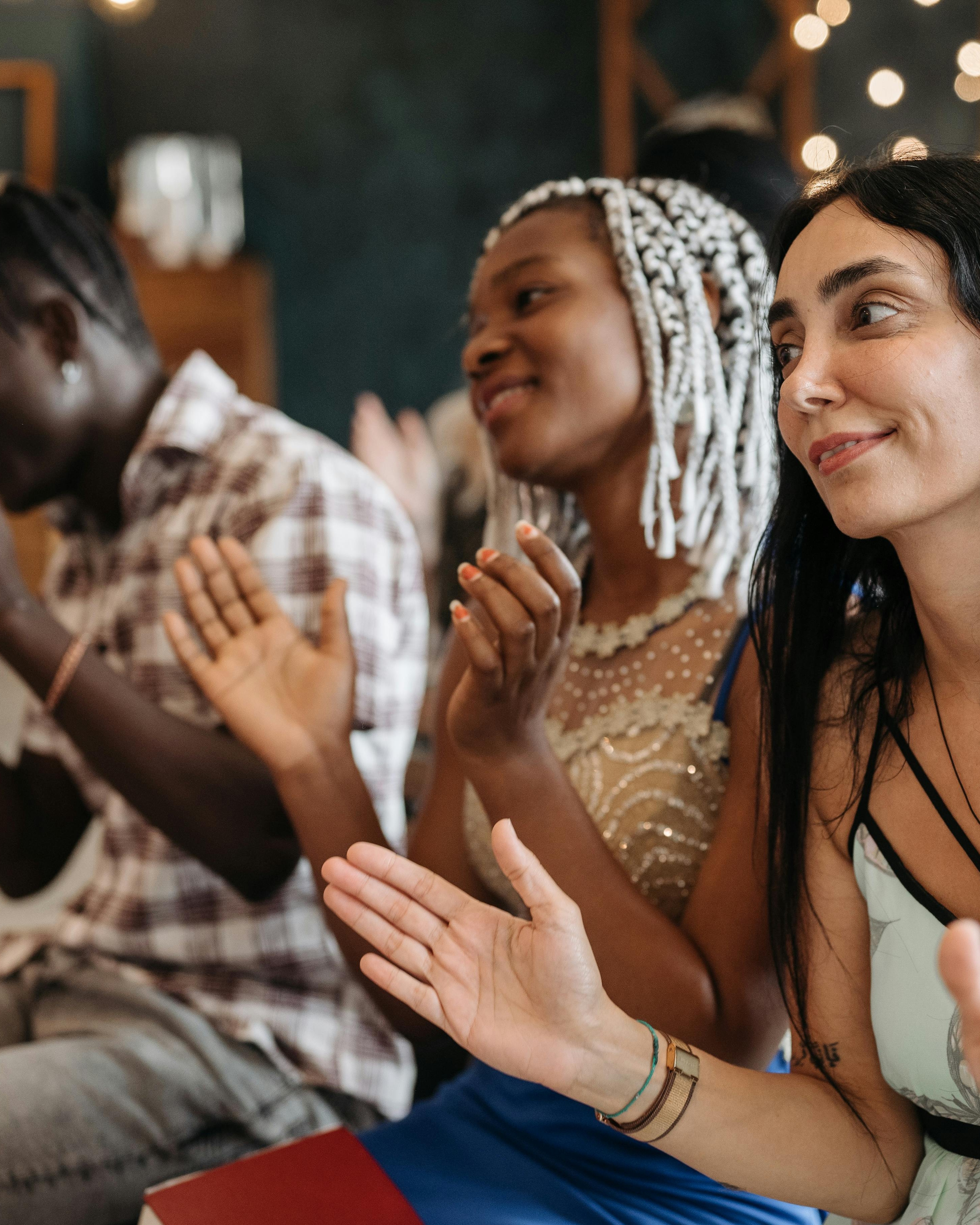 Diverse Group Clapping Together