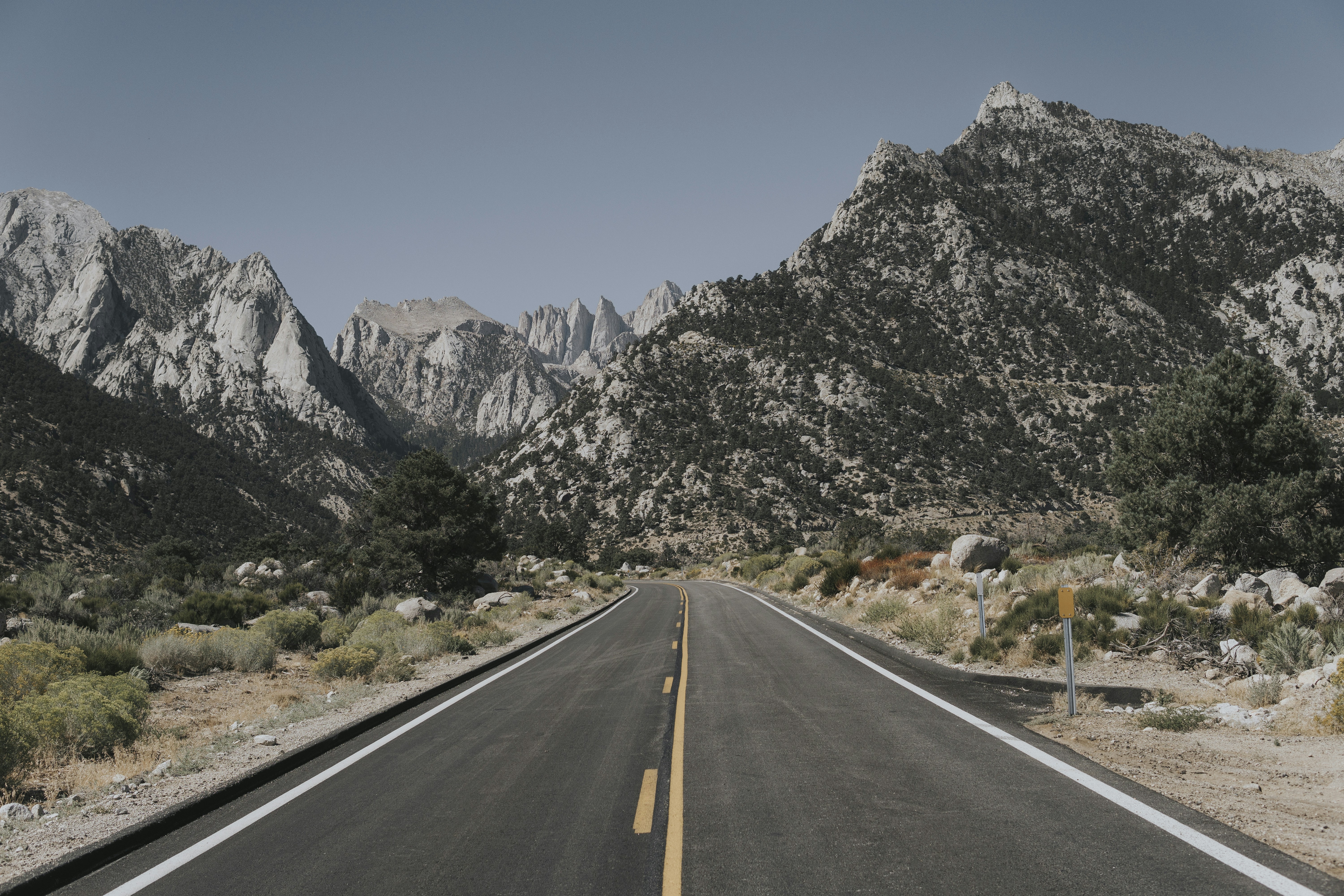 Asphalt Highway Through Rocky Mountains