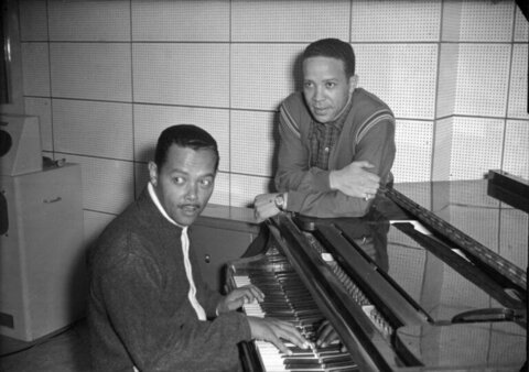 Two Musicians at Grand Piano in Studio