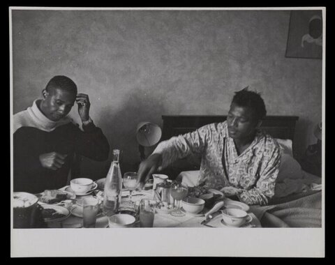 Two Men Sharing a Meal