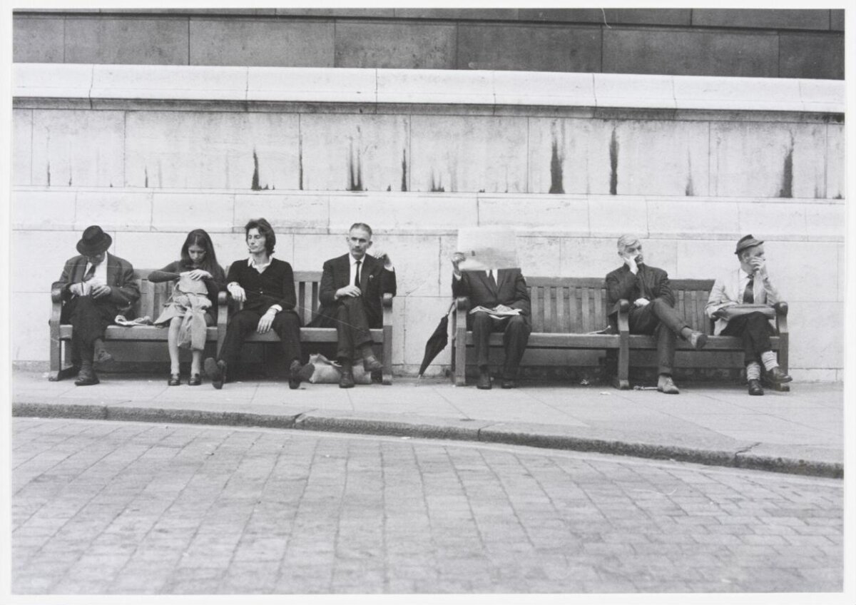 People Resting on Street Benches