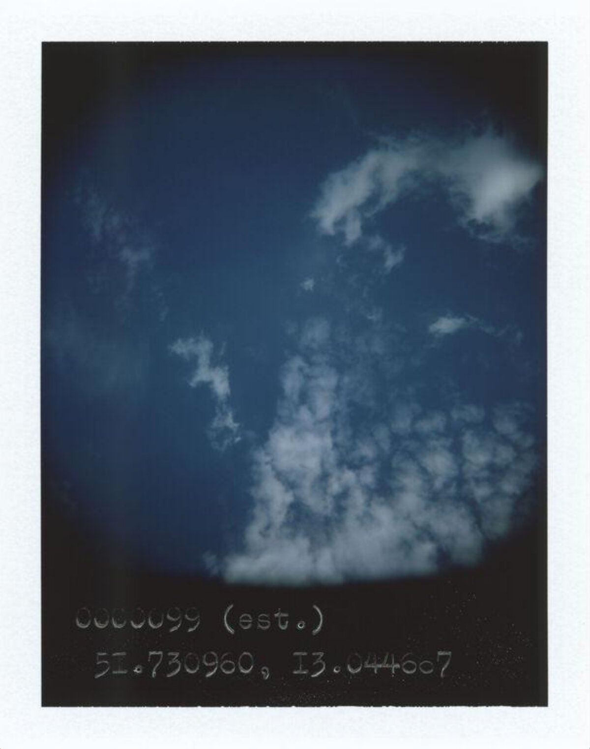 Deep Blue Sky With Clouds