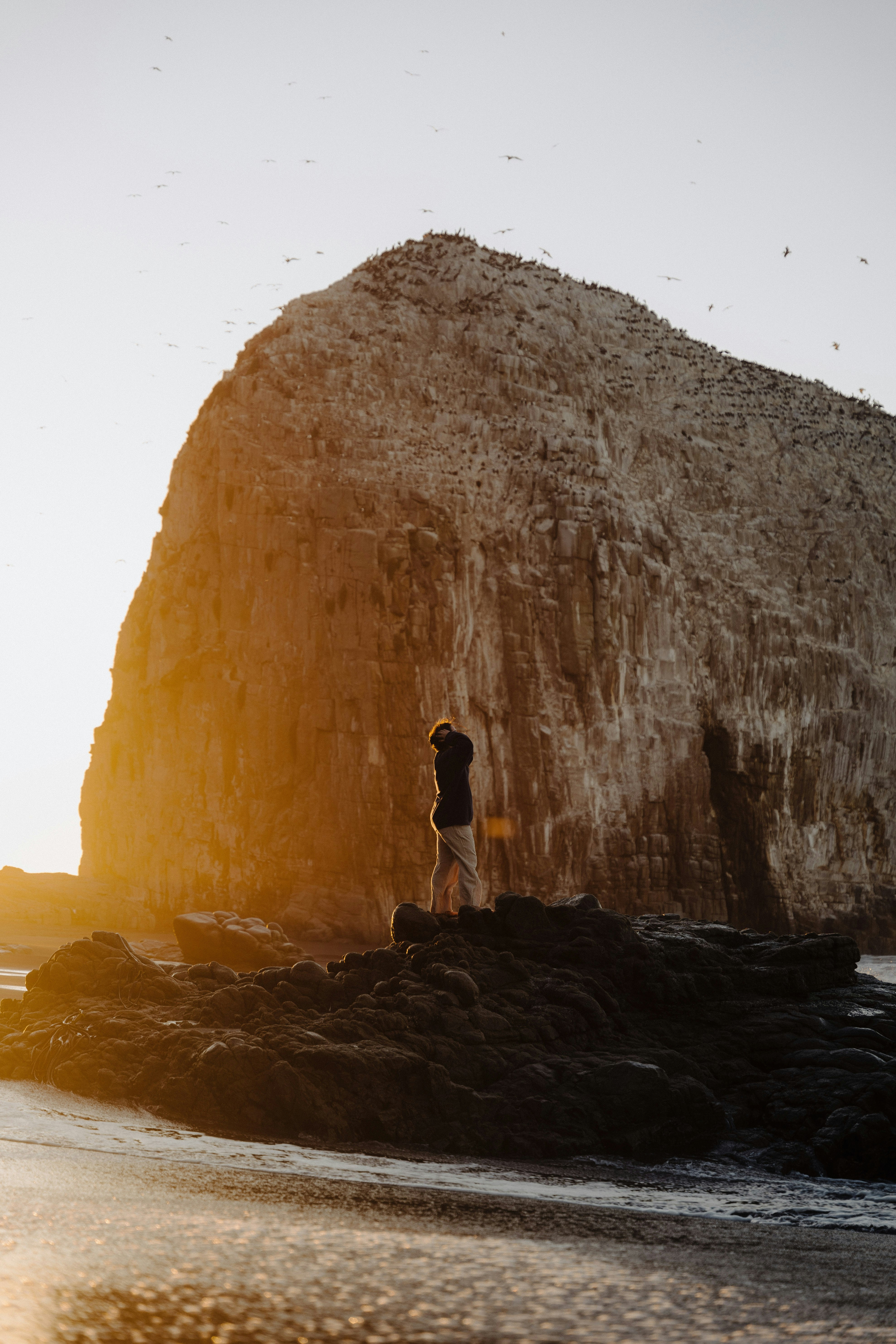 Coastal Sunset With Lone Person