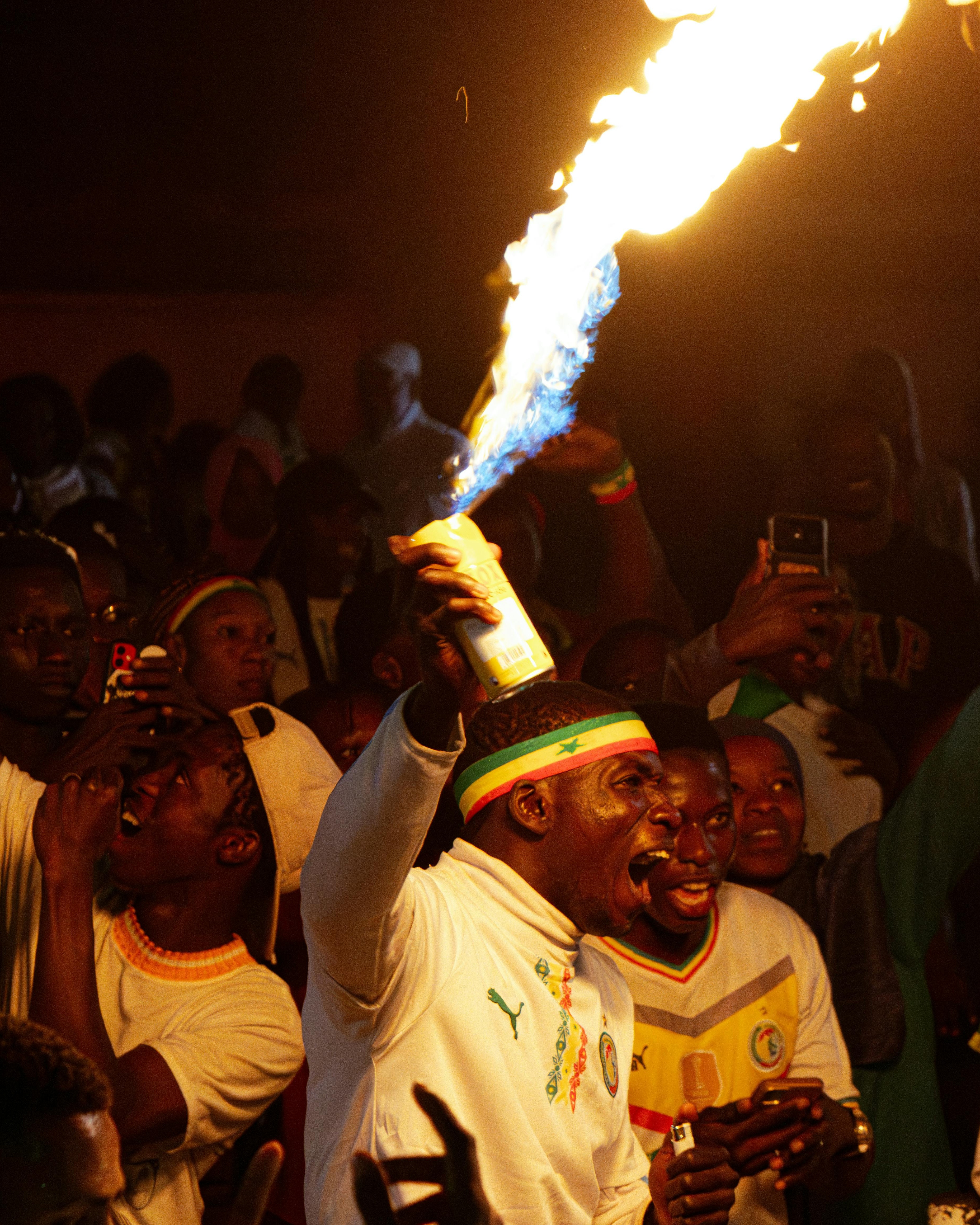 Senegal Football Fans Celebrating With Fire
