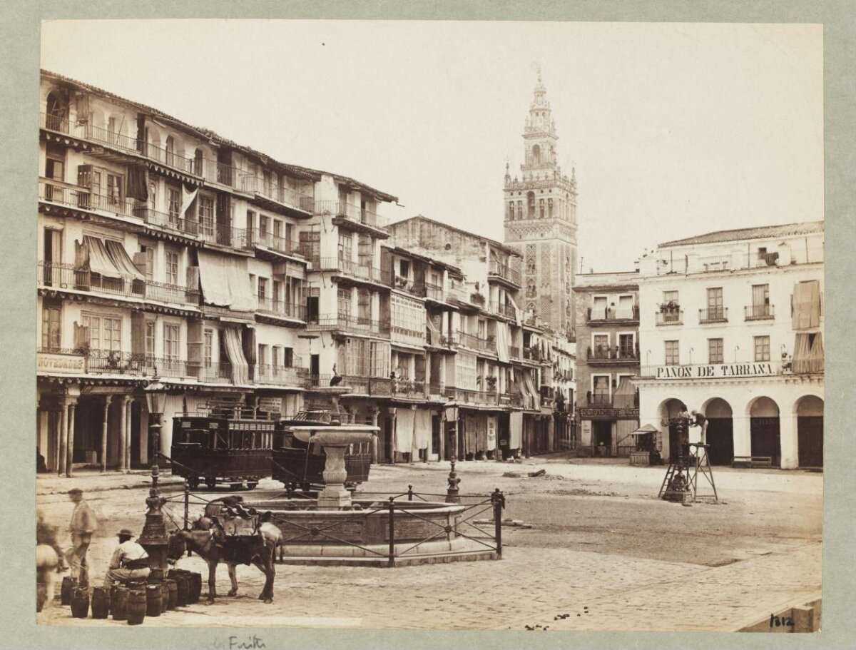 Old Seville Plaza with Giralda Tower