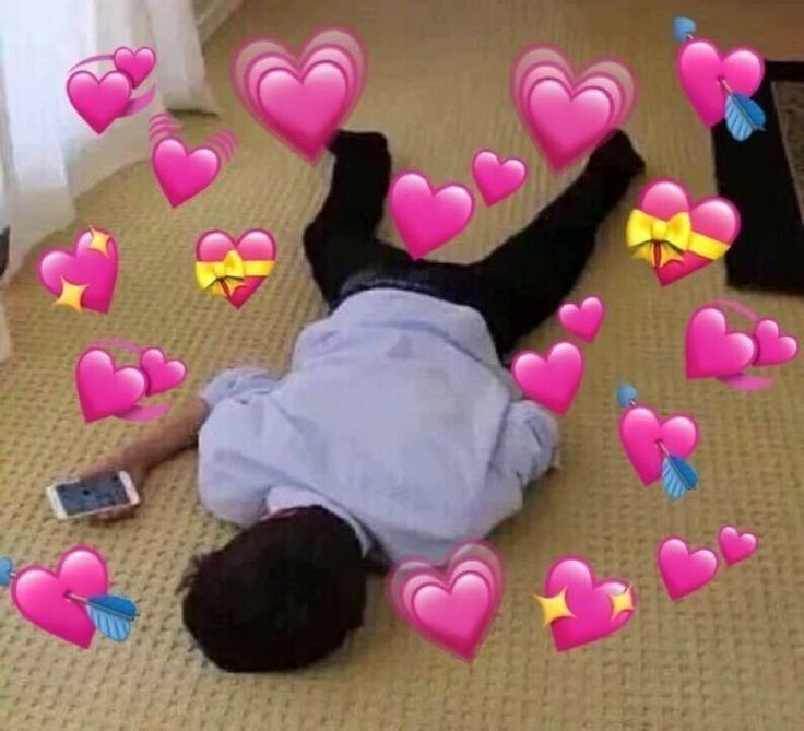 Person Lying on Floor with Heart Emojis