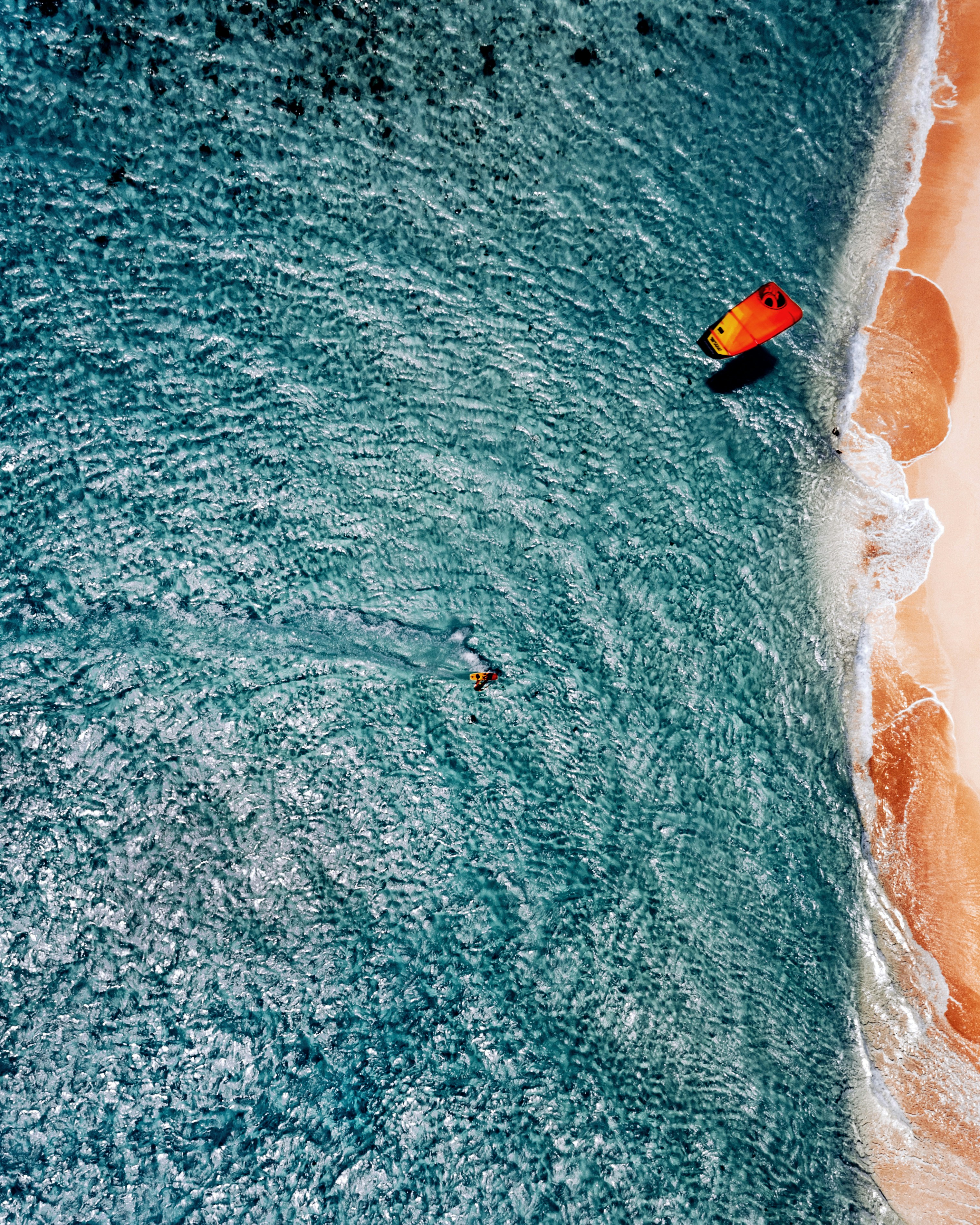 Aerial View of Kite Surfers Near Coast