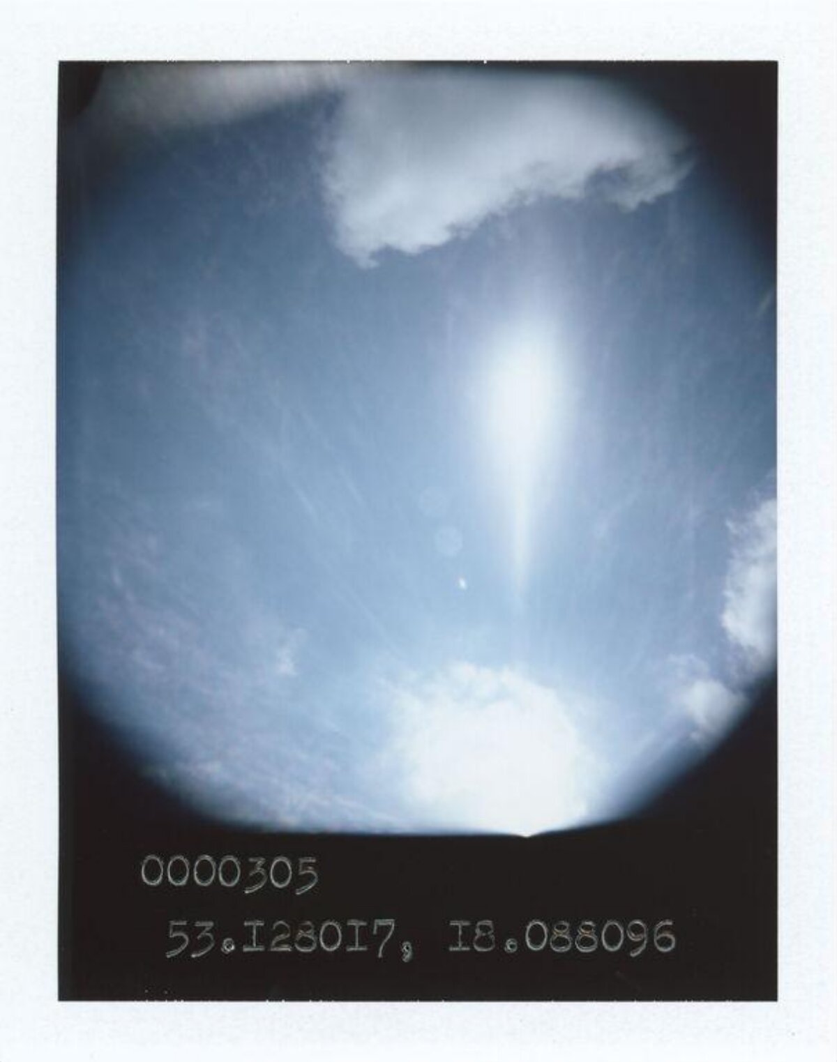 Circular View of Cloudy Blue Sky