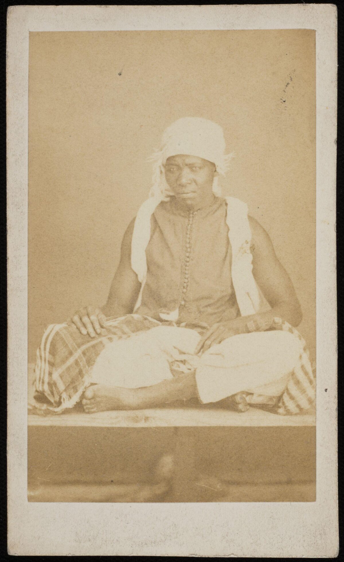 Seated African Man in Vintage Photo