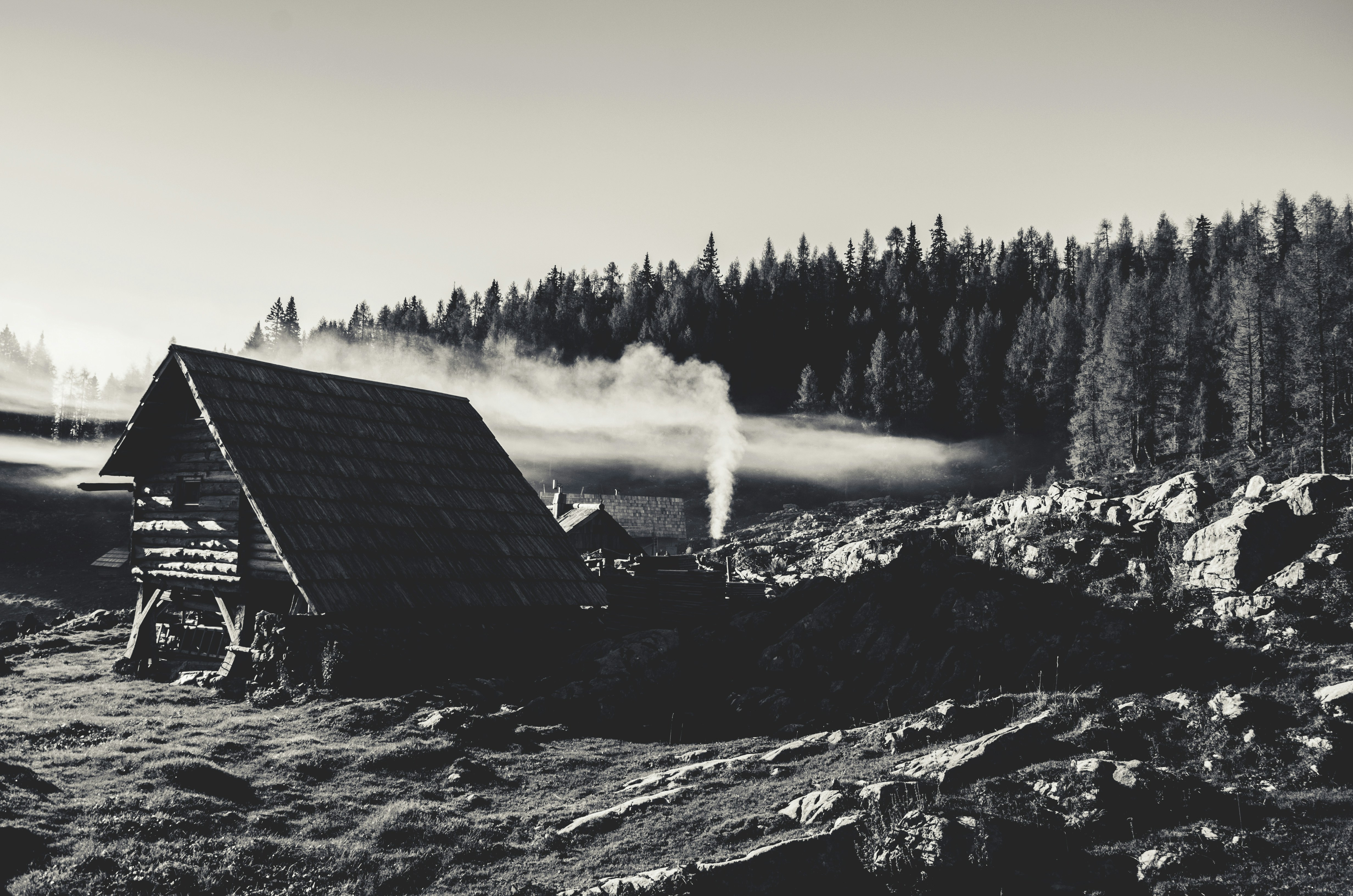 Misty Mountain Cabin with Rising Smoke