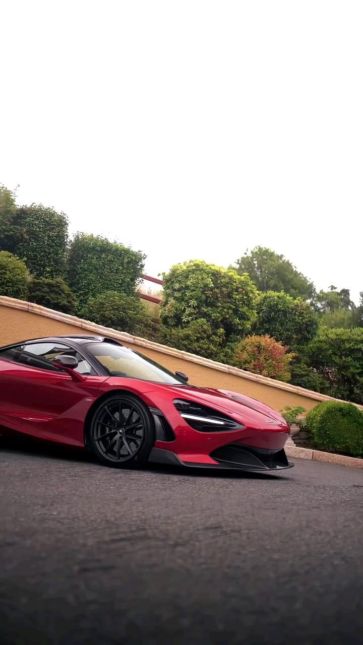 Red McLaren Supercar Parked Outdoors