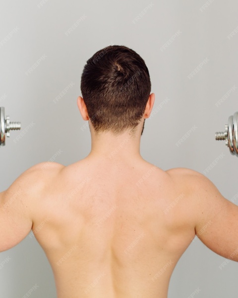 Man Lifting Dumbbells From Behind