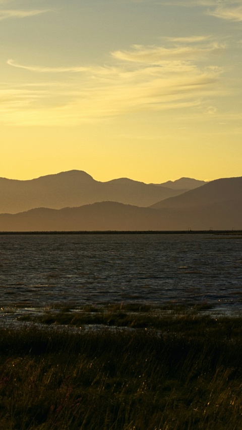 Sunset over Lake and Mountains