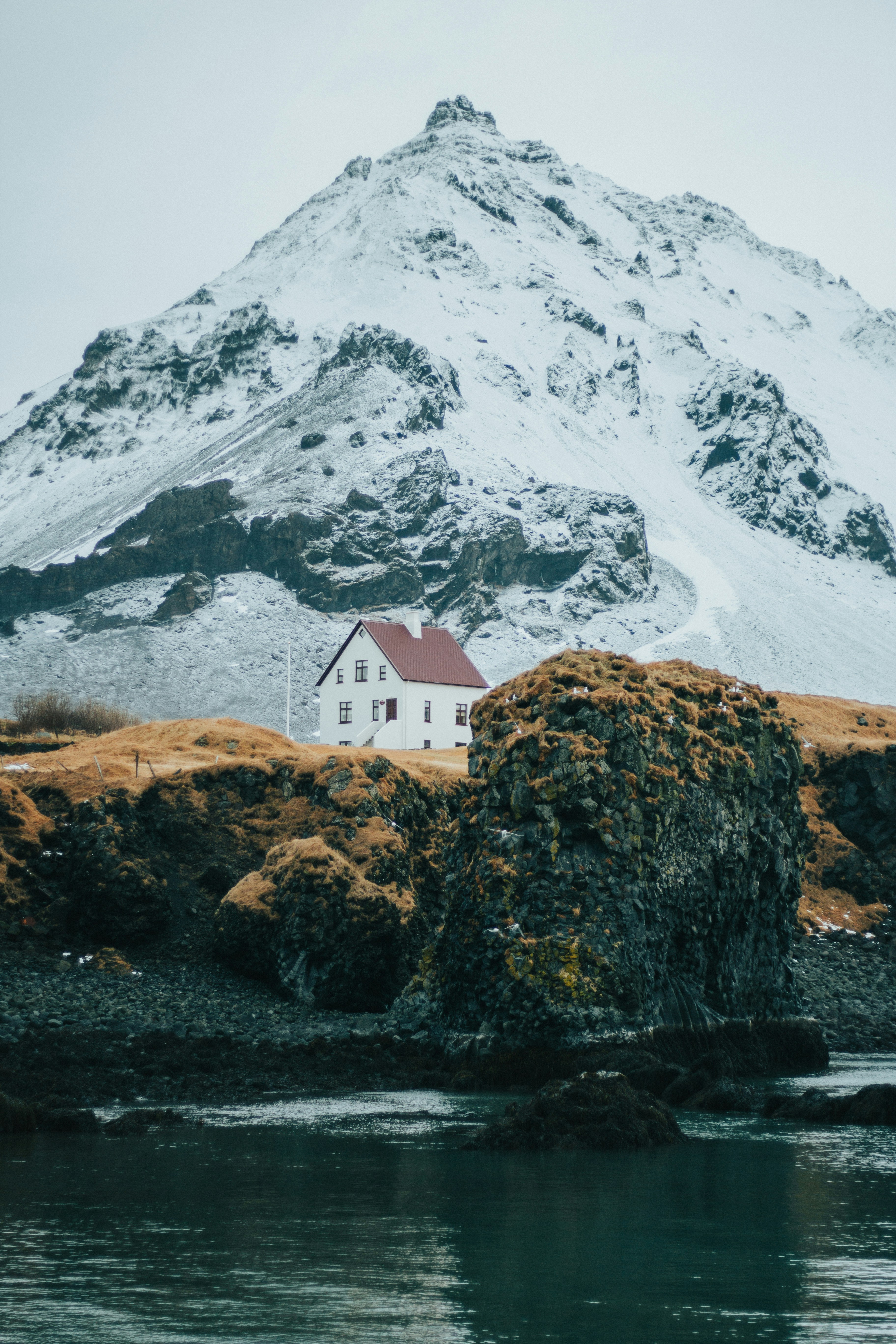 White House Beneath Snowy Mountain