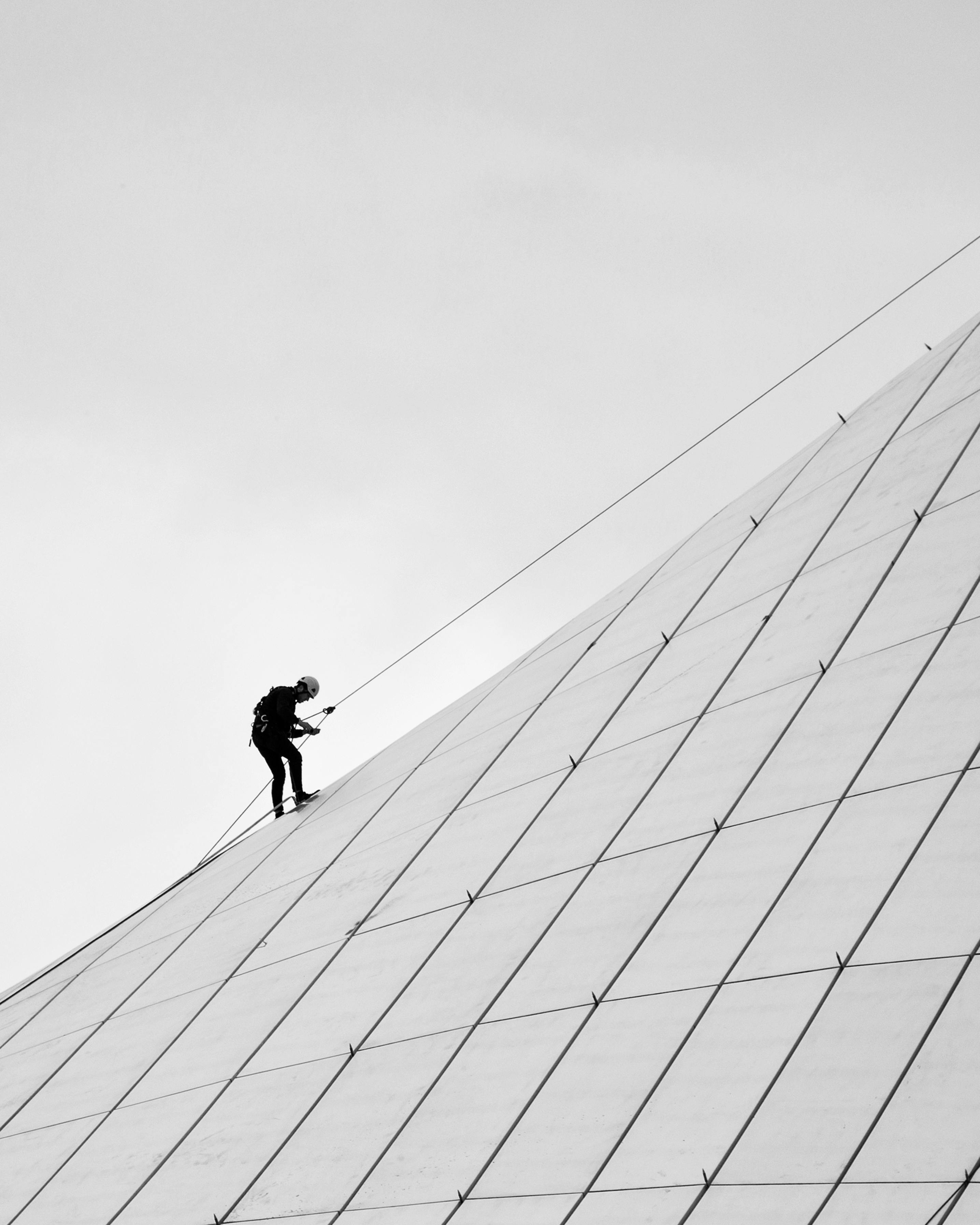 Rope Access Worker Climbing Building Facade