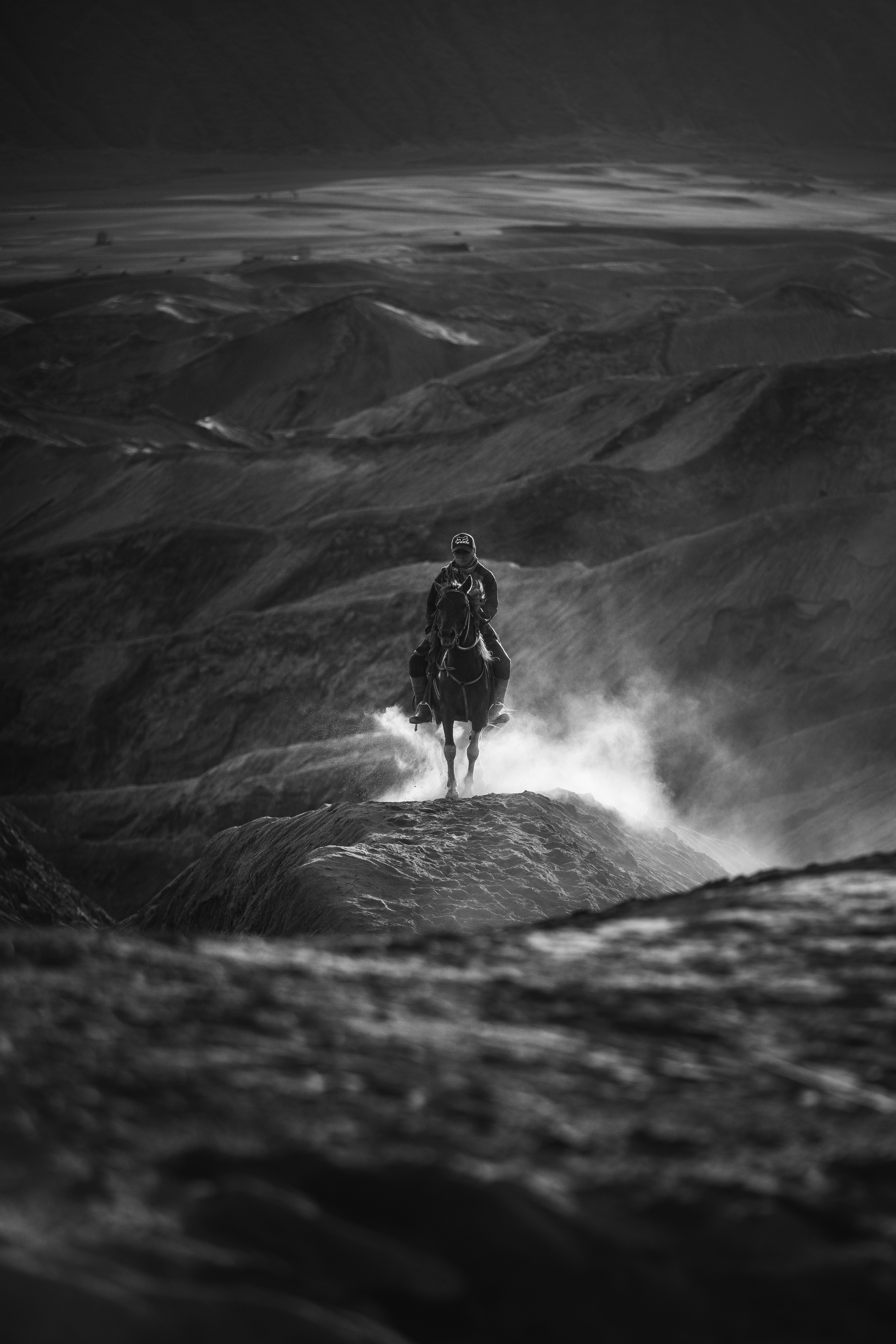 Lone Rider Galloping on Desert Ridge