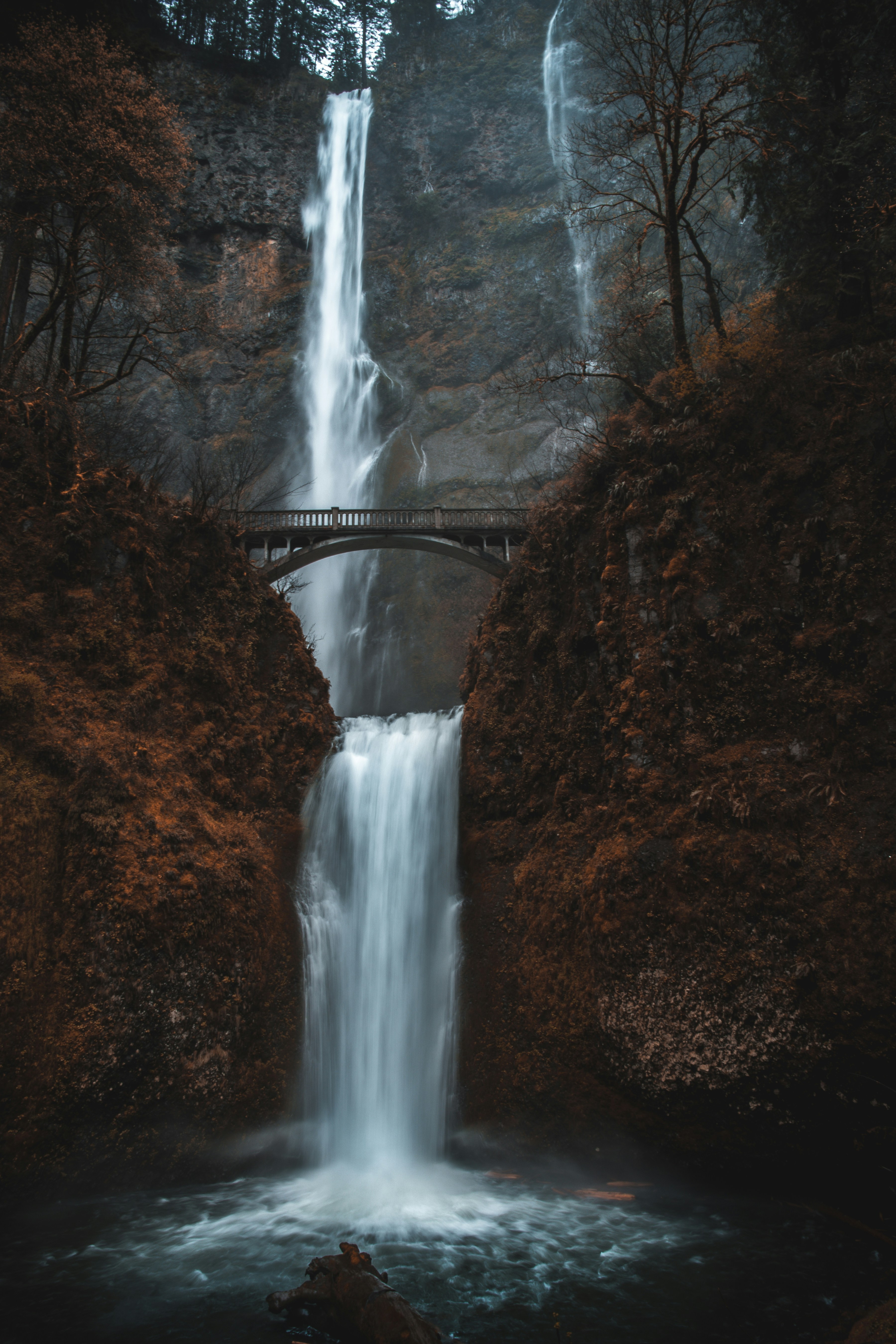 Two-tier Waterfall With Arch Bridge