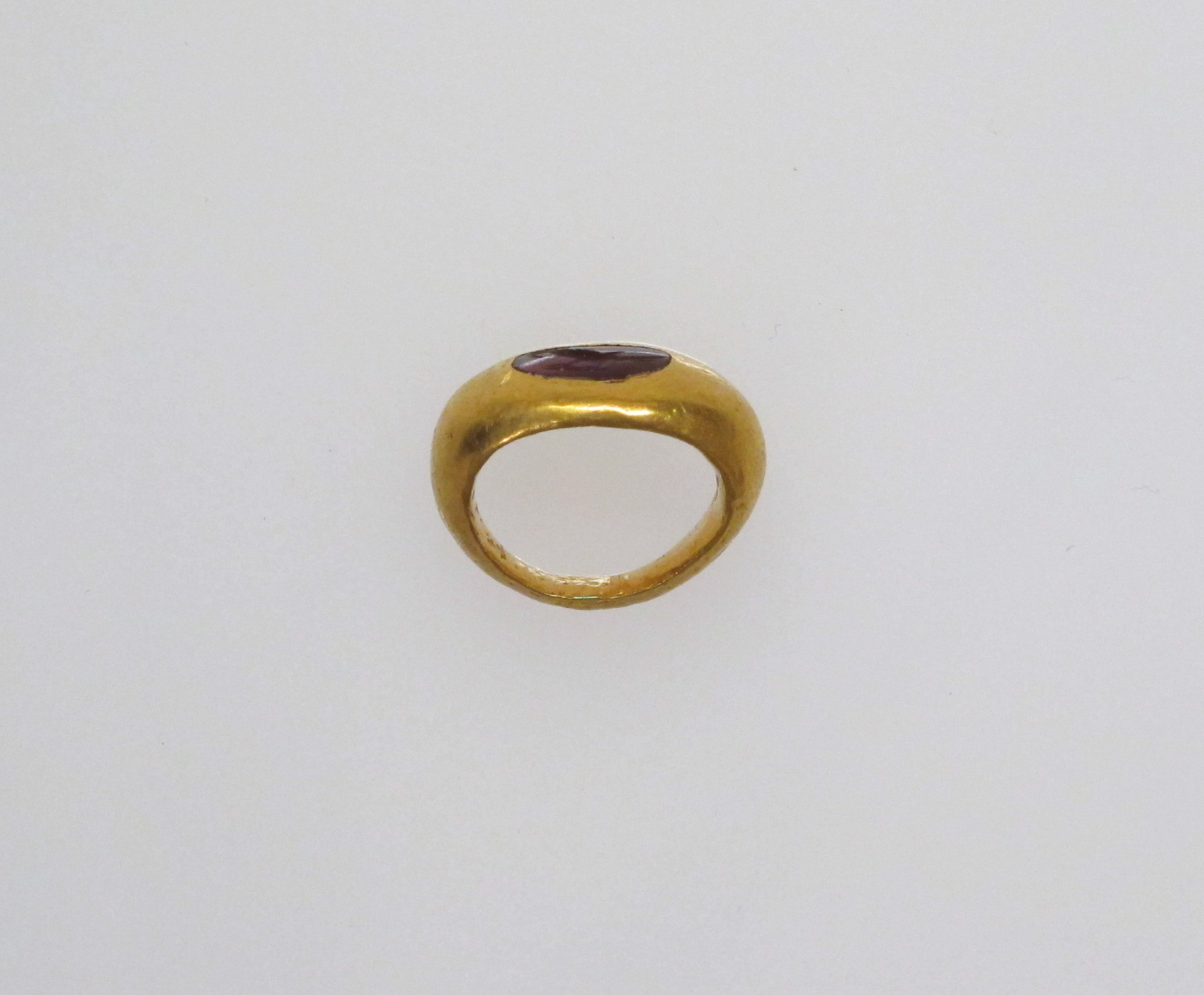 Gold Ring With Oval Purple Gem