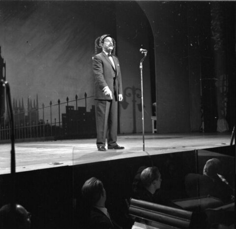 Male Performer Performing on Stage