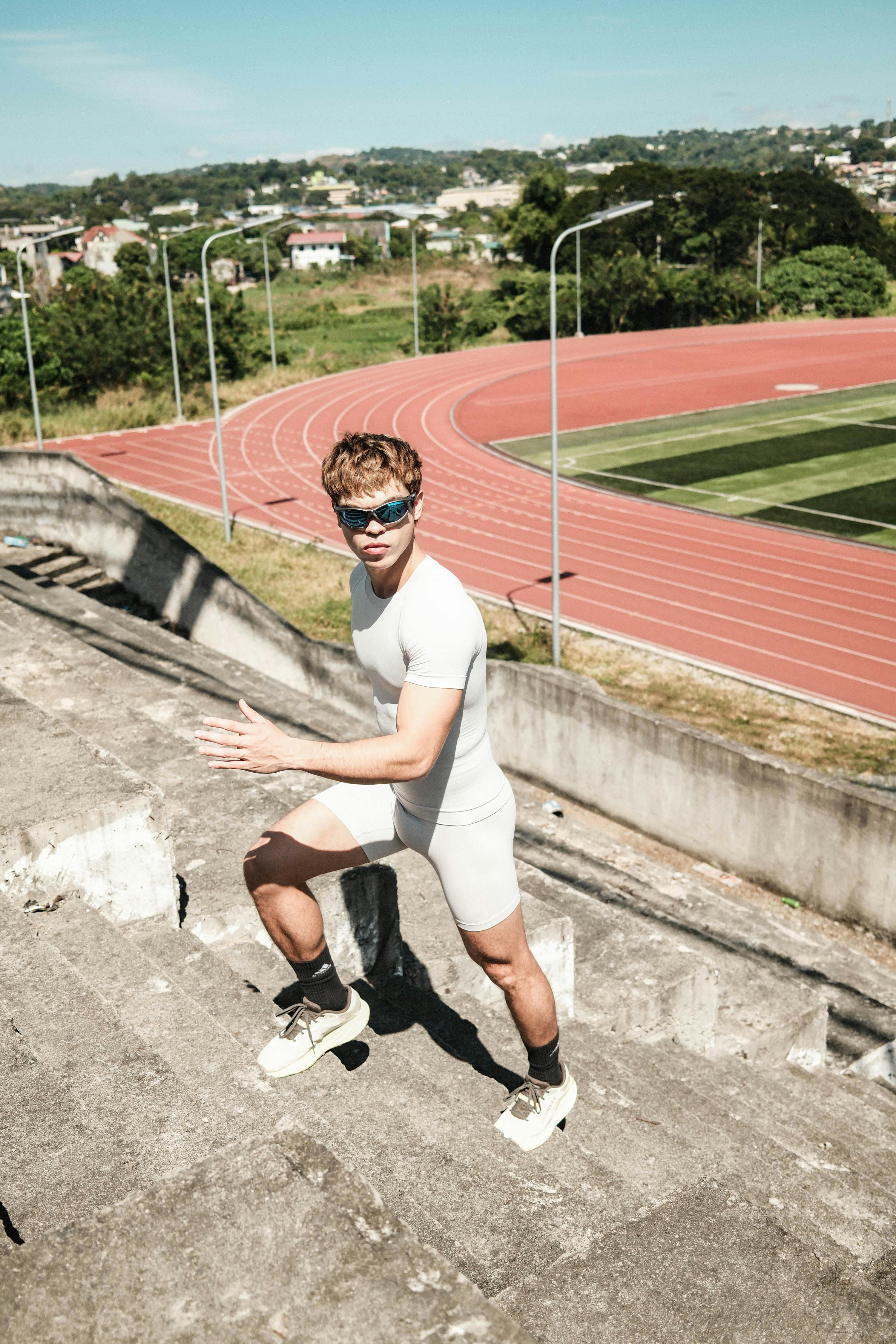 Athlete Training on Outdoor Stadium Stairs