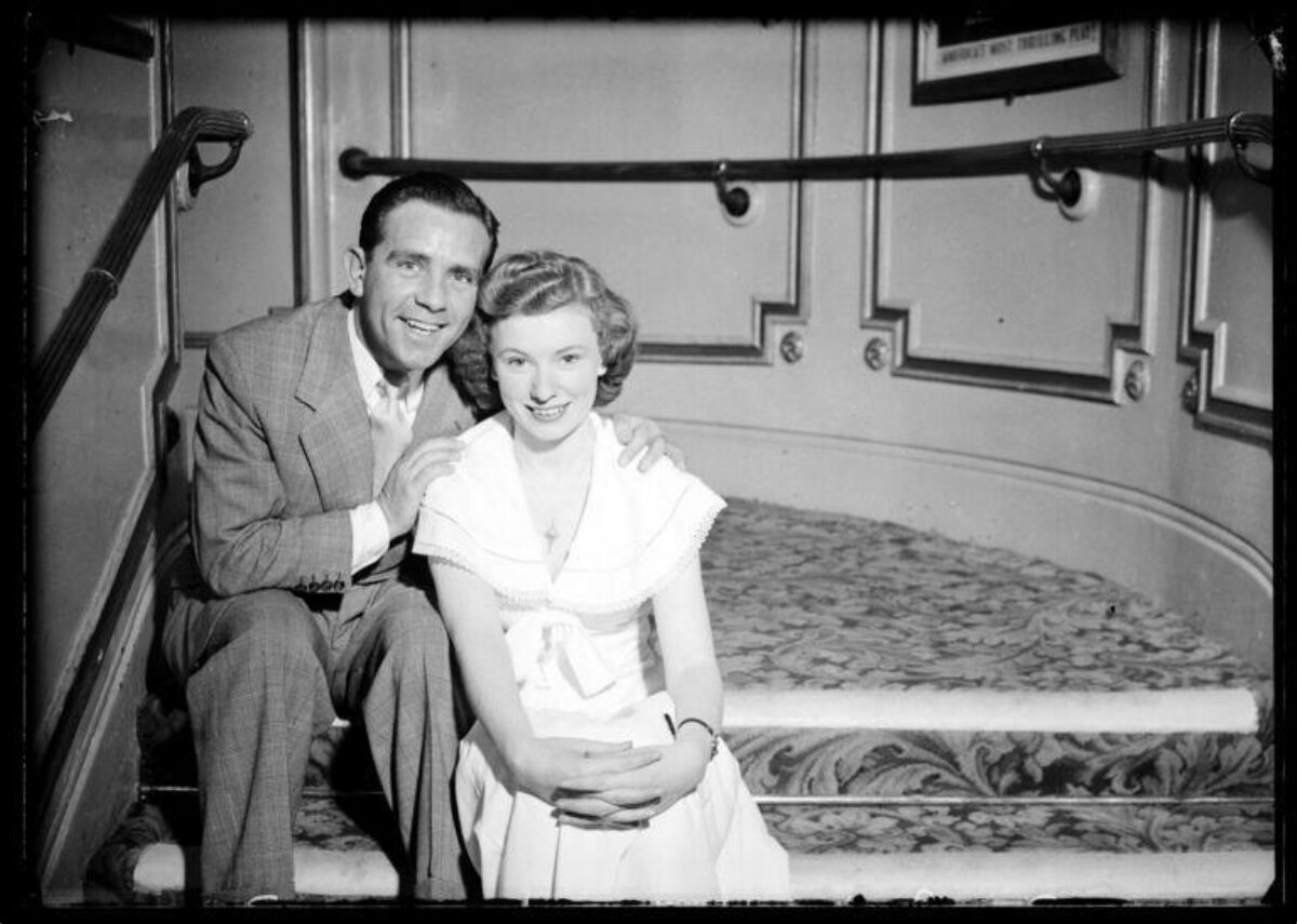 Vintage Couple Posing on Staircase