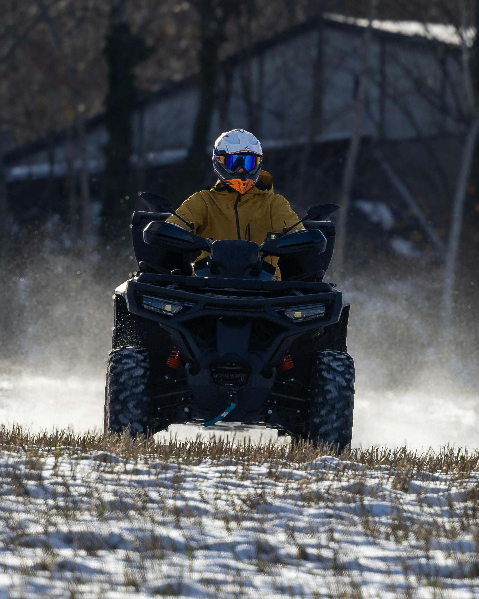 ATV Rider on Snowy Terrain