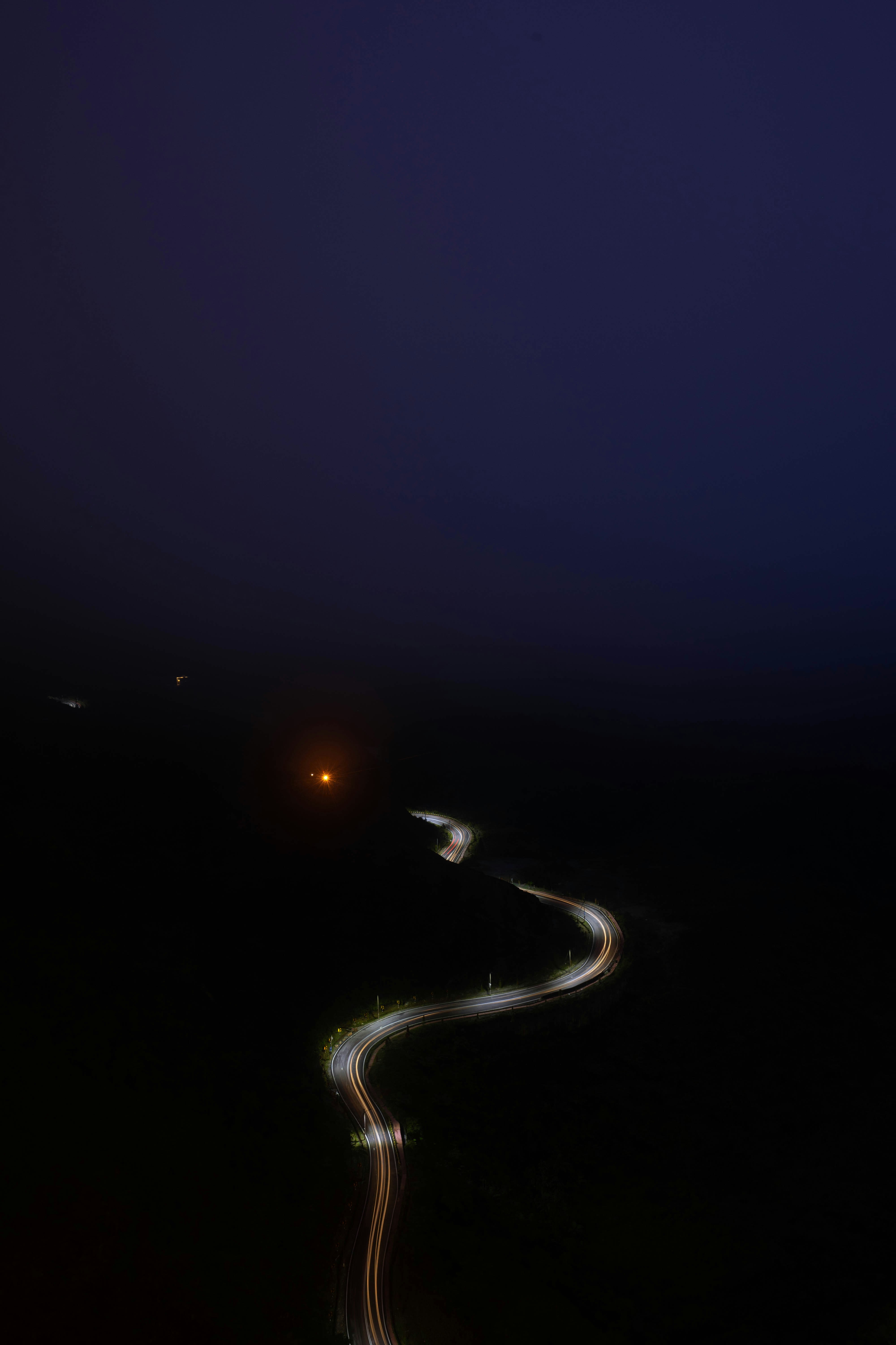 Winding Road Light Trails at Night