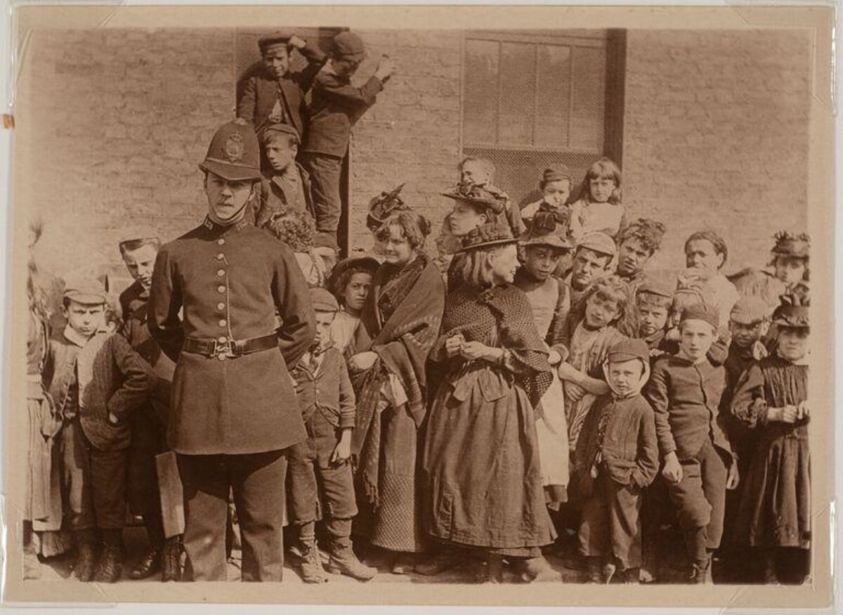 19th Century Policeman With Crowd