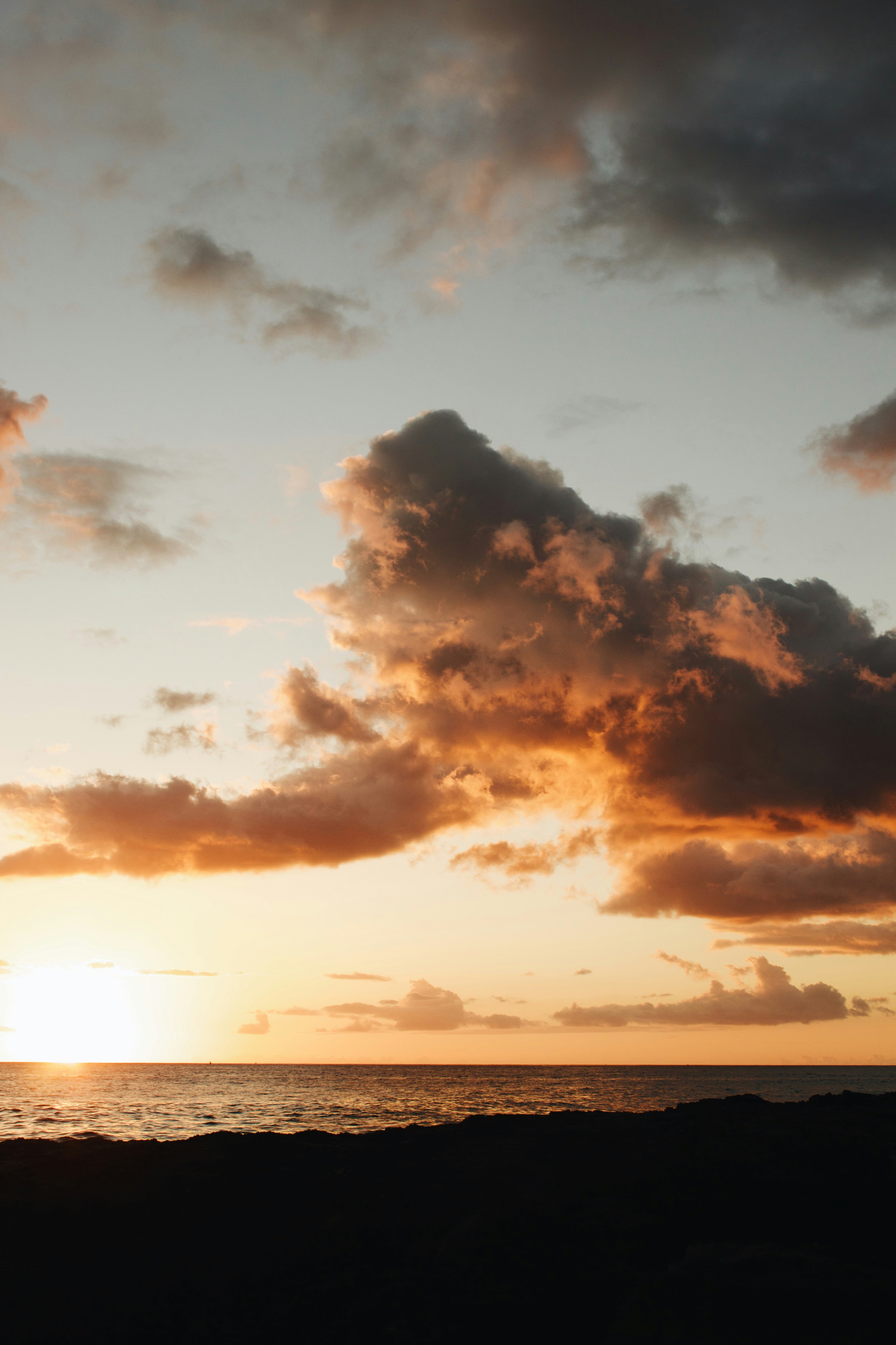 Coastal Sunset Over Ocean