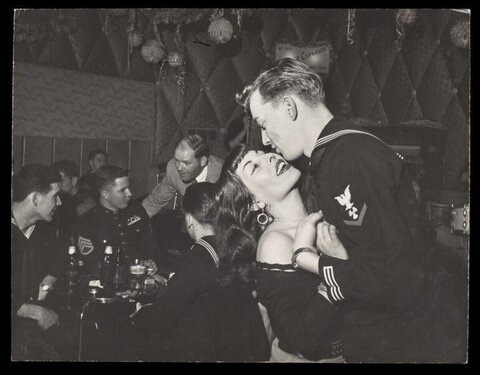 Sailor Kissing Entertainer at Wartime Nightclub