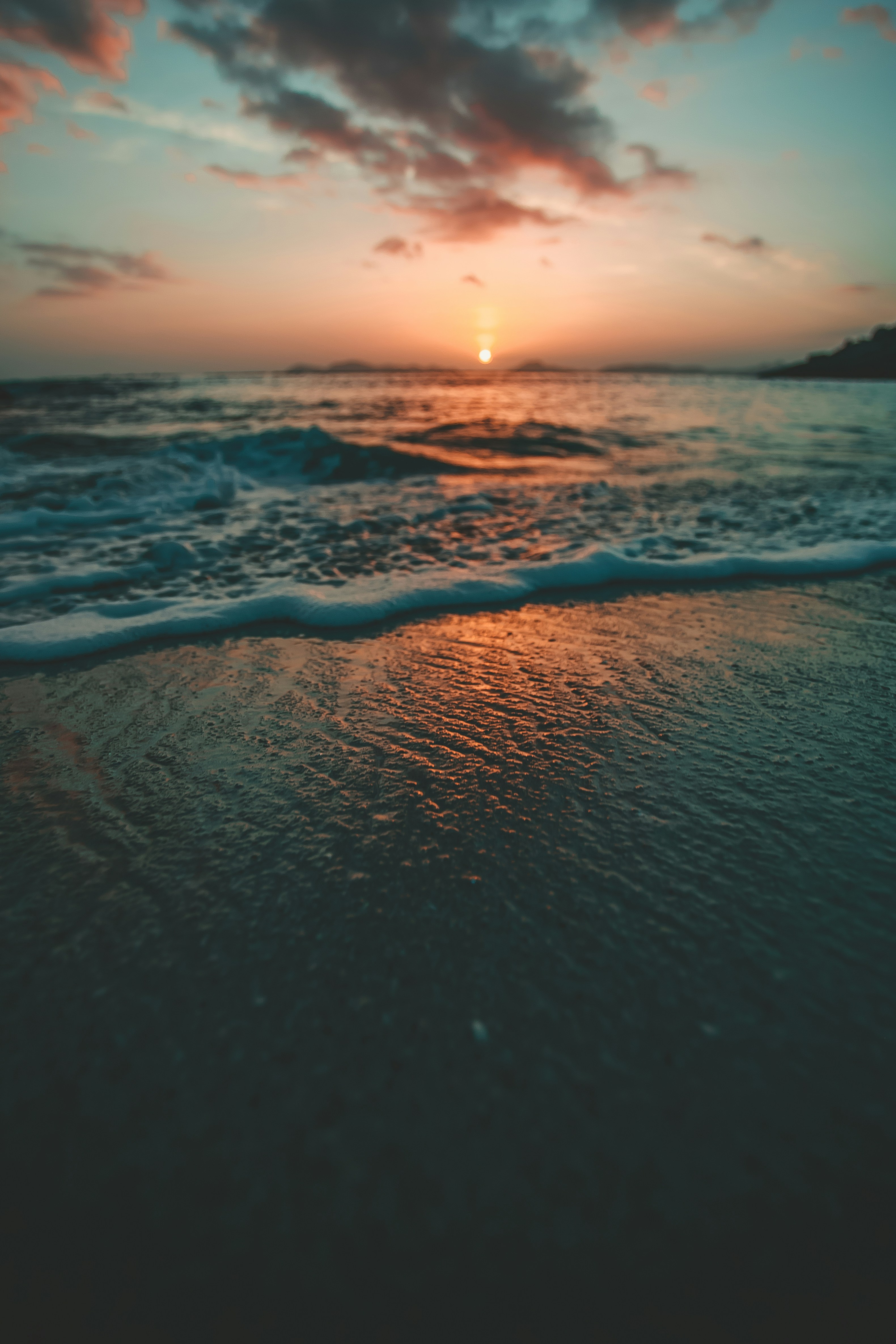 Sunset Over Coastal Beach