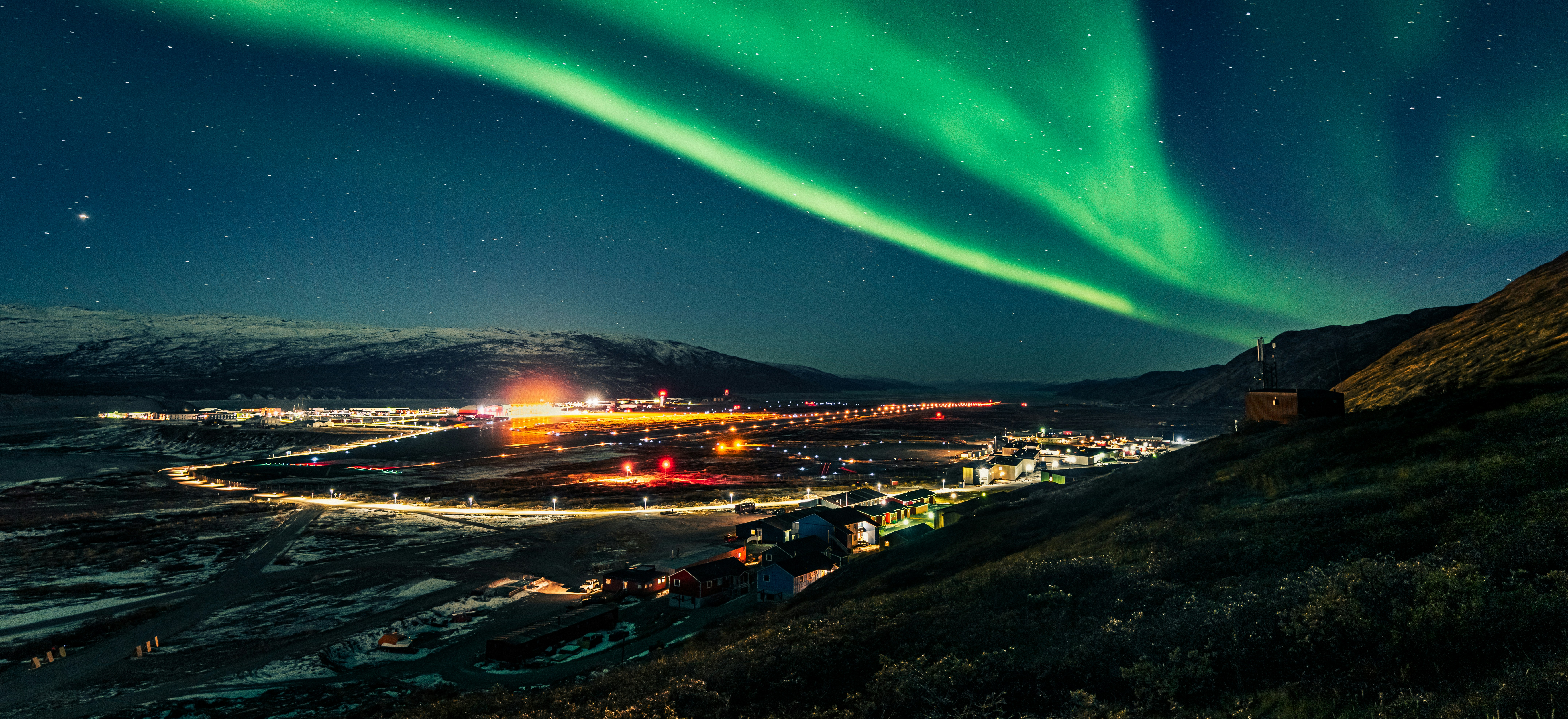Northern Lights Over Arctic Town