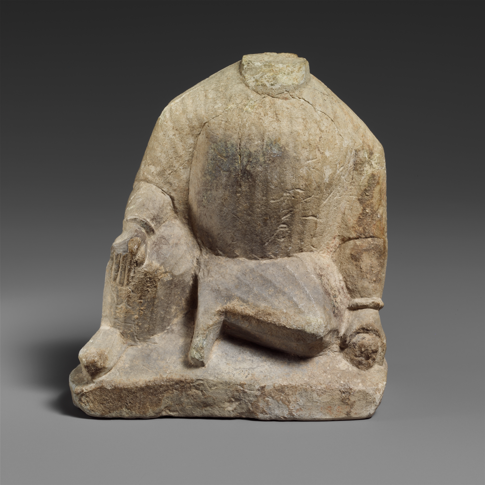 Headless Seated Stone Sculpture