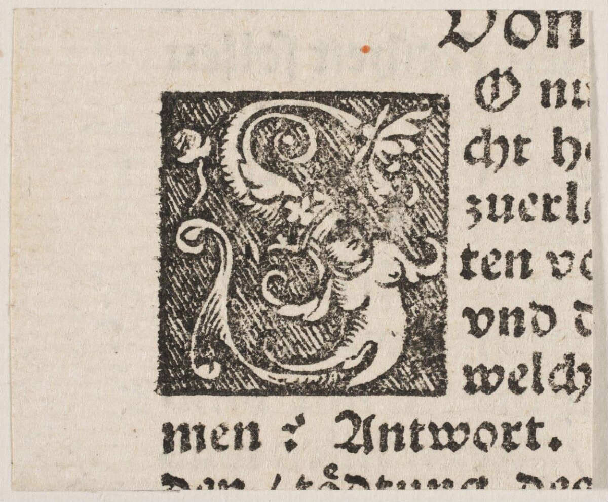 Decorative Woodcut Initial on Early Printed Page