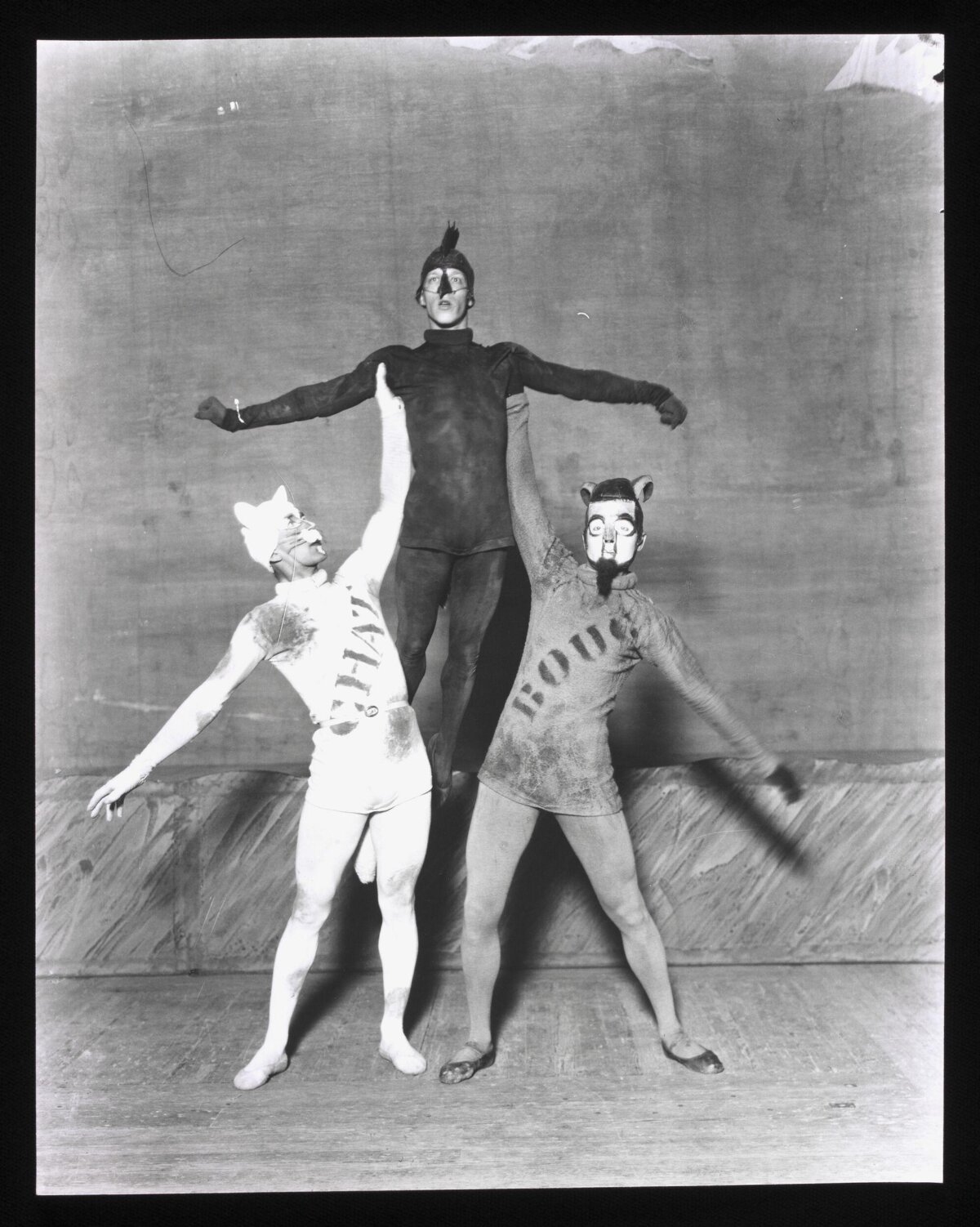 Three Costumed Dancers Stage Pose