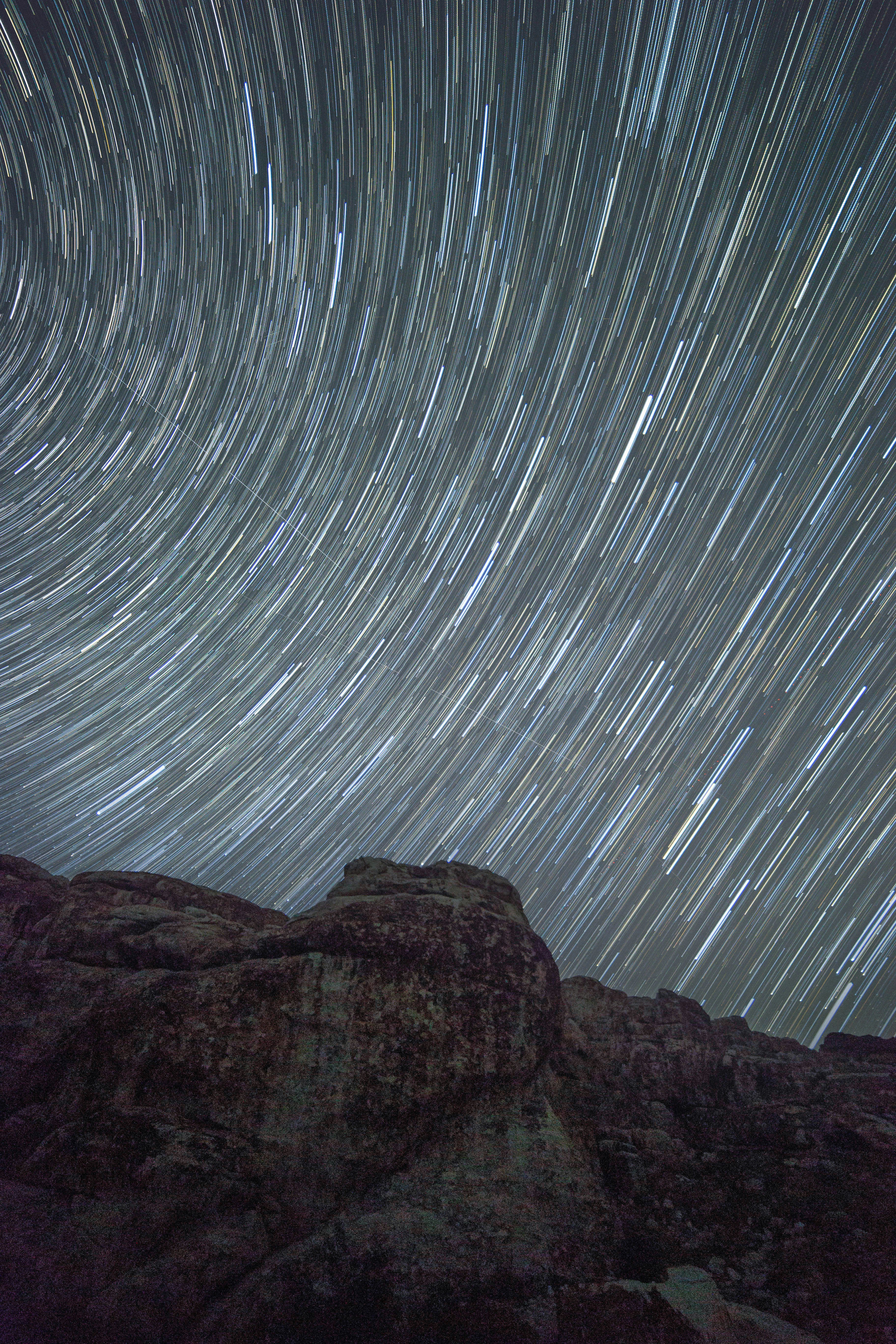 Star Trails Over Rocky Terrain