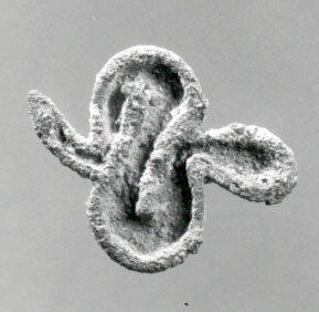 Ancient Corroded Knot-shaped Artifact